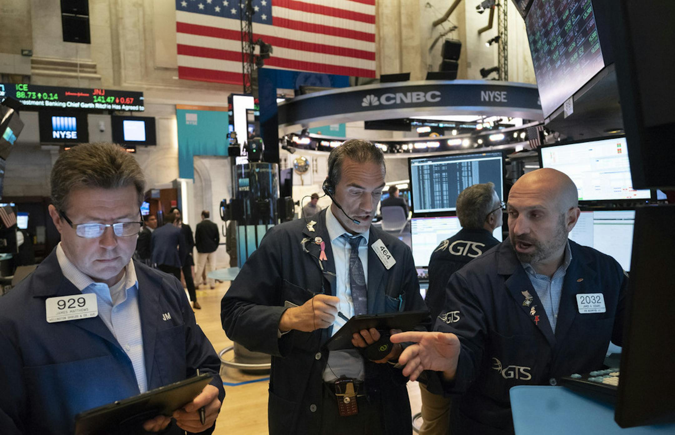 Traders work at the New York Stock Exchange, Friday, July 5, 2019 in New York. (AP Photo/Mark Lennihan)