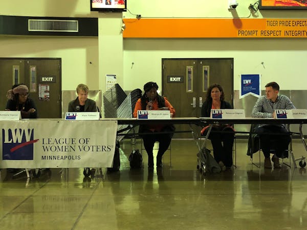 Minneapolis school board candidates spoke at a forum Tuesday night. From left to right they are, Kimberly Caprini, moderator Pam Telleen, Sharon el-Am