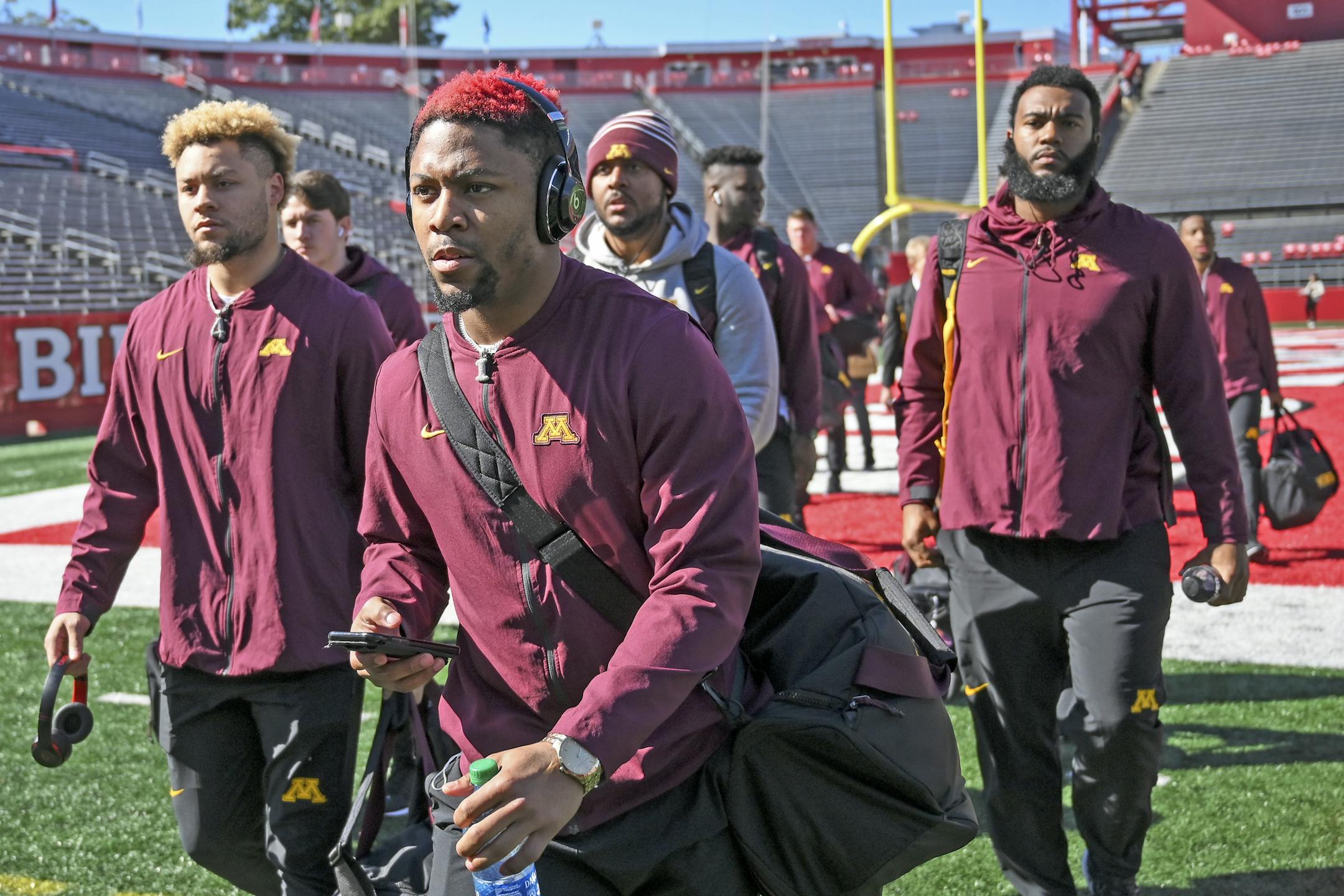 Gophers players, including Gophers running back Rodney Smith (1), center, and Gophers running back Shannon Brooks (4), left, made their way toward the visiting team locker room upon their arrival at SHI Stadium Saturday. ] Aaron Lavinsky • aaron.lavinsky@startribune.com The Gophers played Rutgers on Saturday, Oct. 19, 2019 at SHI Stadium in Piscataway, N.J.. ORG XMIT: MIN1910191211386712