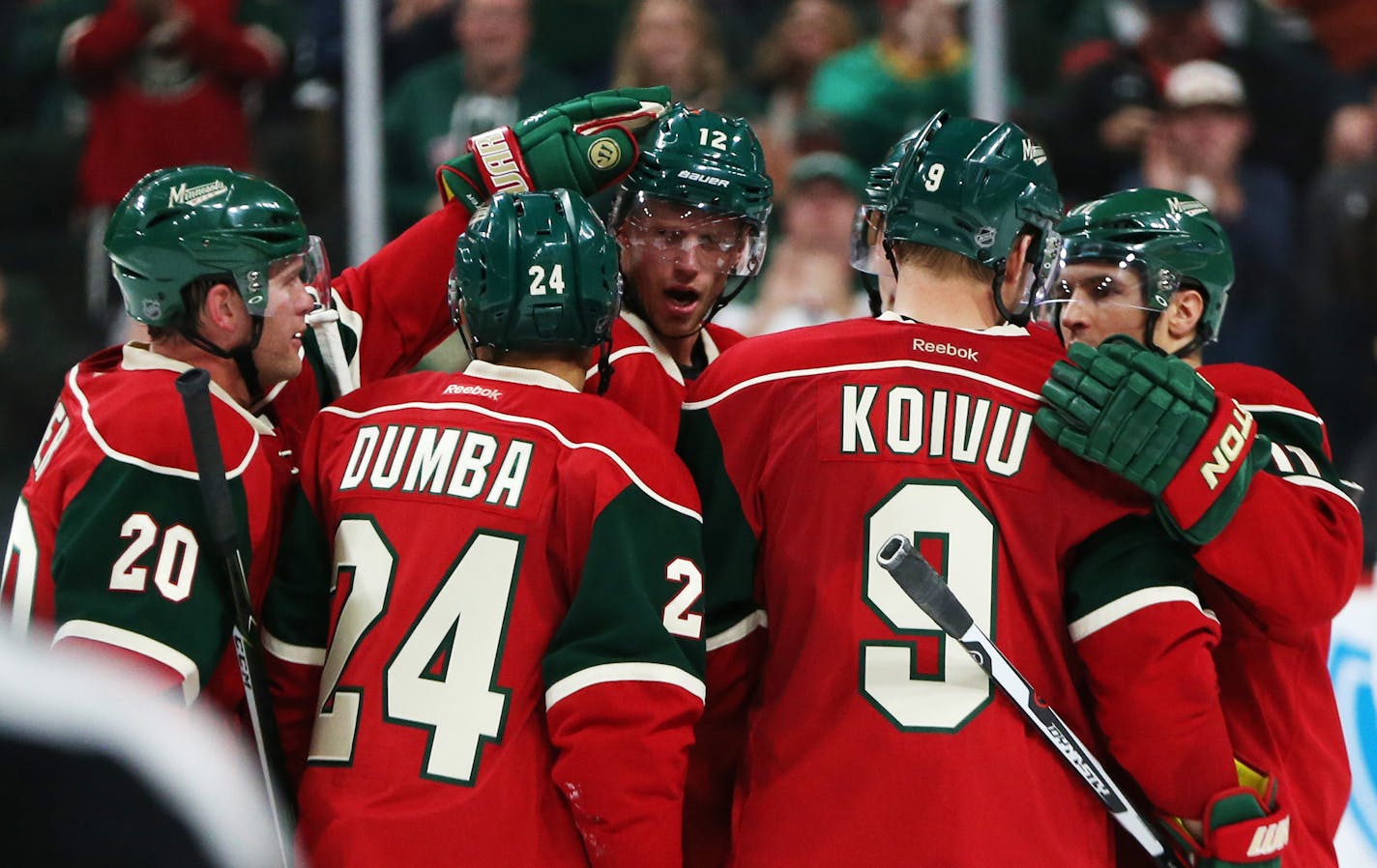 The Wild's Ryan Suter, Matt Dumba, Mikko Koivu and Zach Parise celebrated with center Eric Staal after this third period goal. ] Mark Vancleave - mark.vancleave@startribune.com * The Carolina Hurricanes played the Minnesota Wild on Sunday, Oct. 2, 2016 at the Xcel Energy Center in St. Paul, Minn.