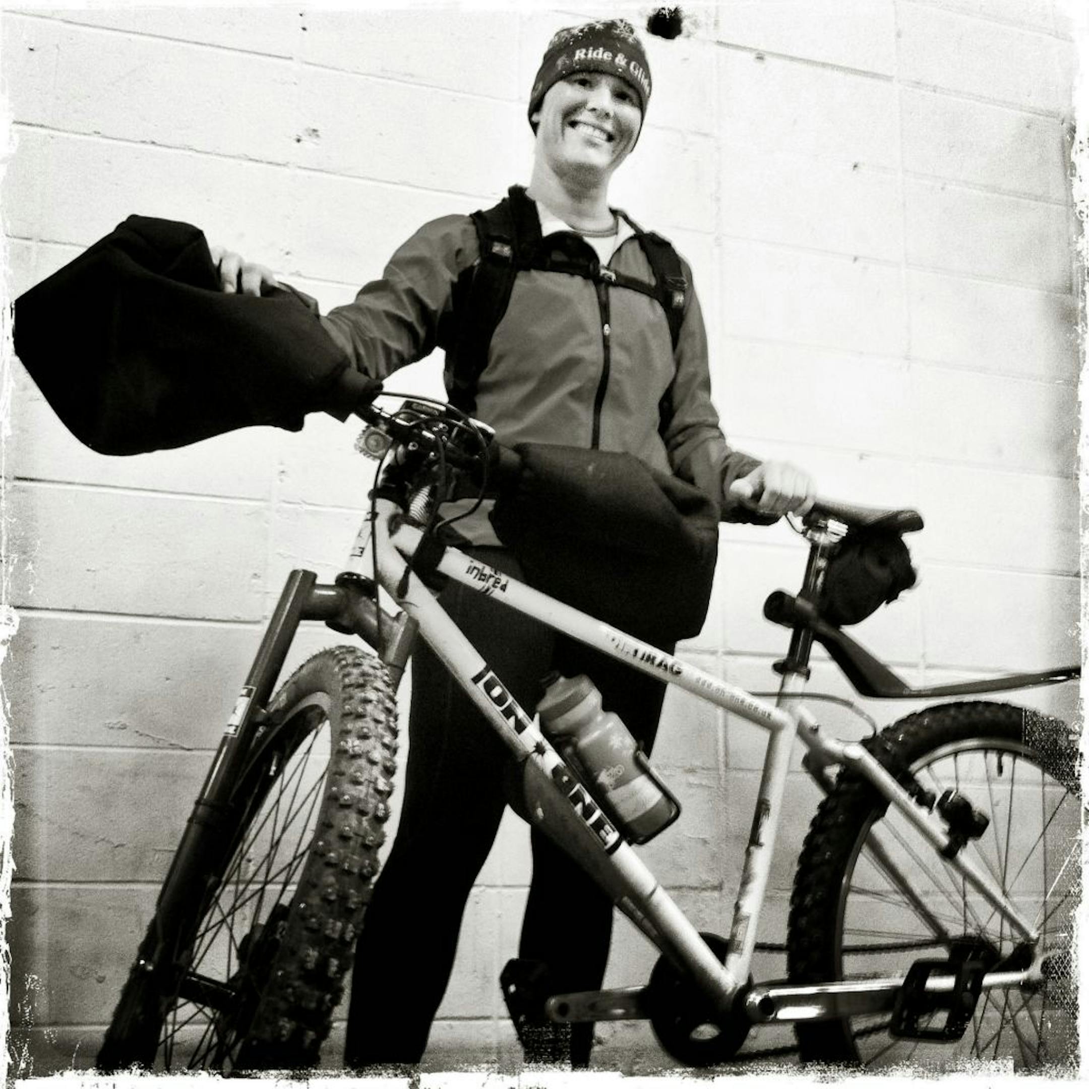 Mara Larson commutes to her work at the headquarters of Erik's Bike Shop on her mountain bike year round.
