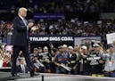 President Donald Trump was a strong advocate for the coal industry when he was running for president, as signs emphasized at a rally Aug. 21, 2018, in
