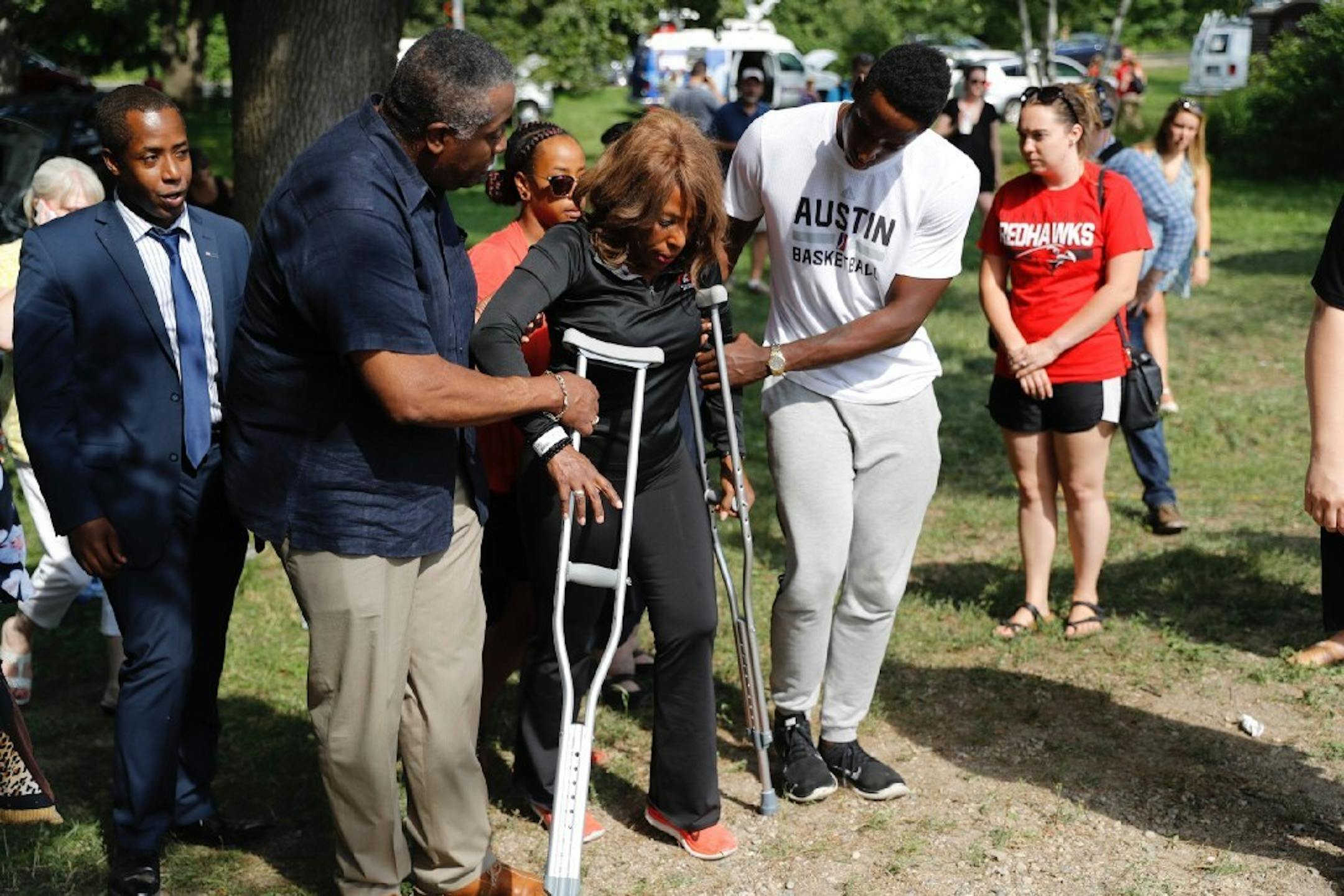 Minnehaha Academy President Donna M. Harris returned to the Minneapolis school on crutches after the explosion Wednesday.