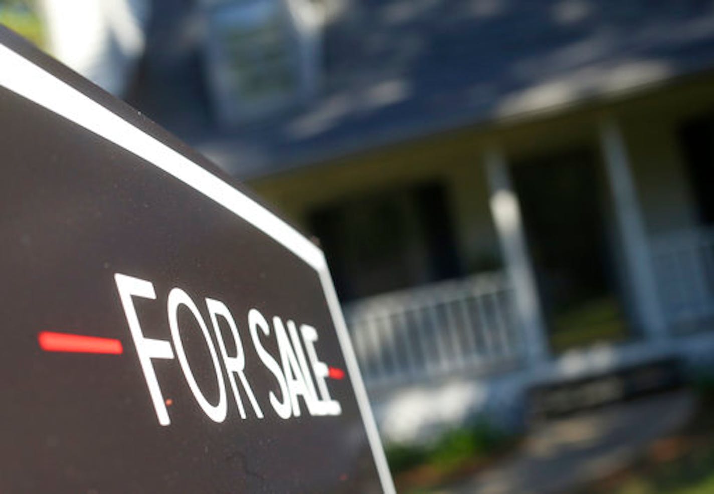 FILE- This Wednesday, Oct. 3, 2018, file photo shows a home offered for sale in the Atlanta suburb of Roswell, Ga. On Thursday, Oct. 11, Freddie Mac reports on the week's average U.S. mortgage rates. (AP Photo/John Bazemore, File)