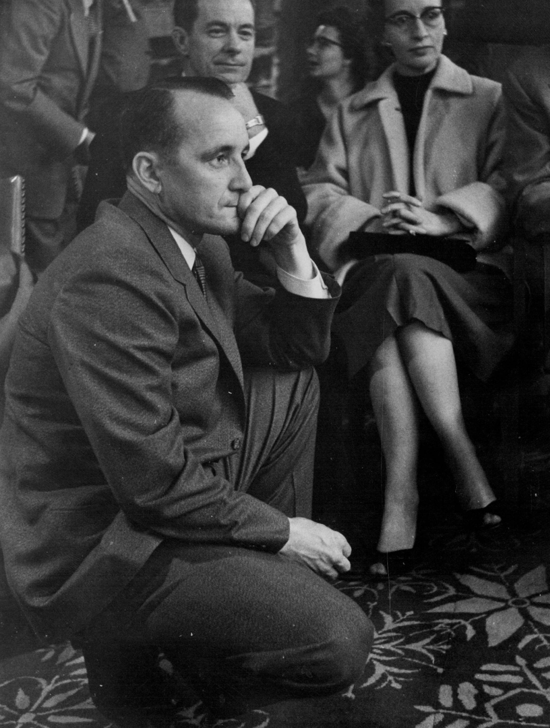 November 7, 1956 Watching returns at DFL headquarters in Leamington hotel, Attorney General Miles Lord Squatted down on the floor, peered intently at blackboard November 6, 1956 Earl Seubert, Minneapolis Star Tribune