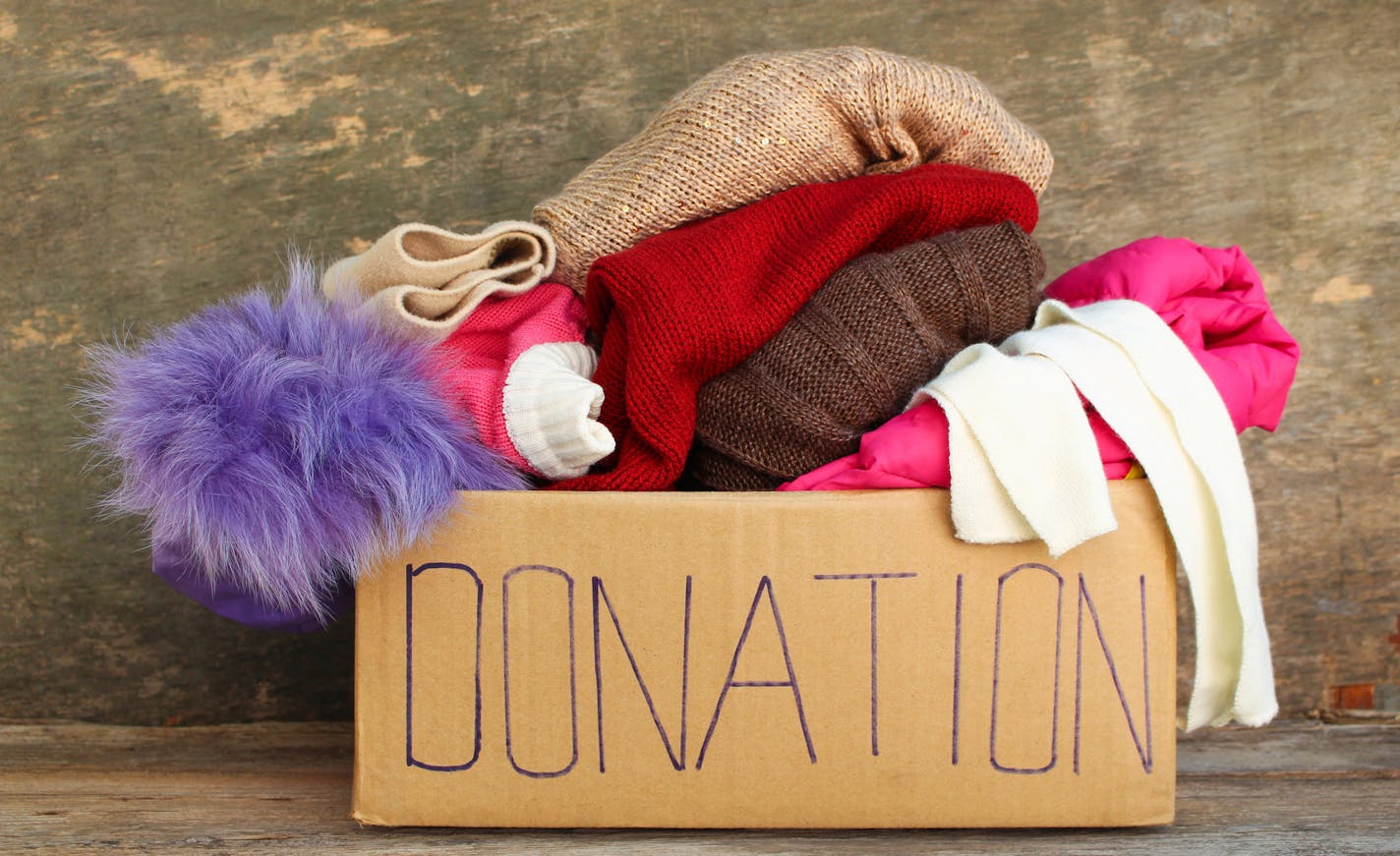 Donation box with clothes. istock