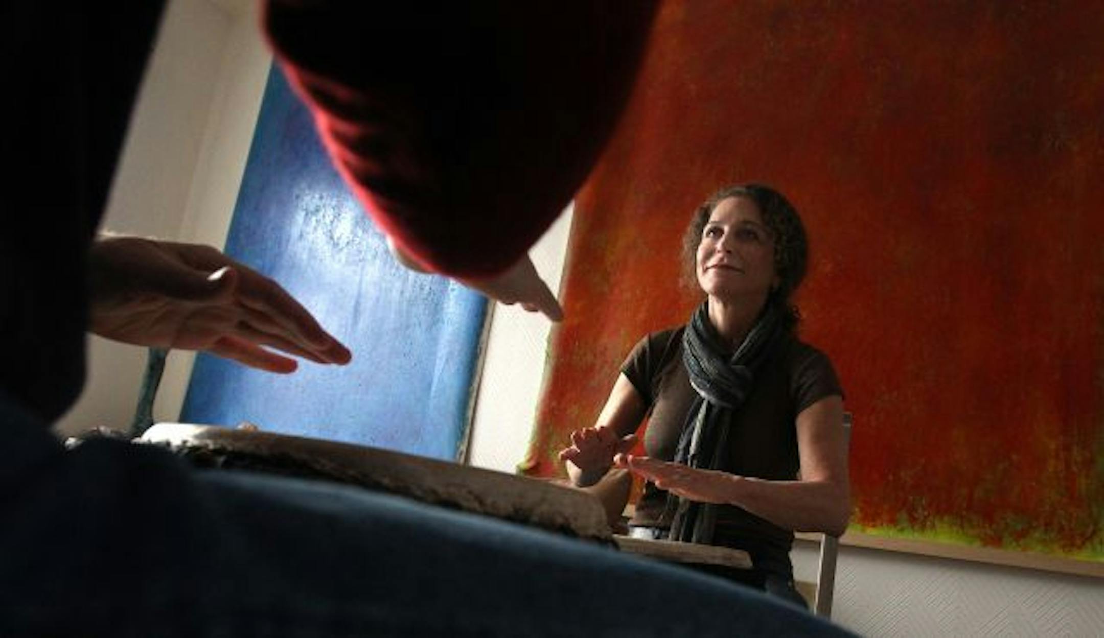 Cathy Bratter, drumming under the guidance of teacher Al Dworsky.