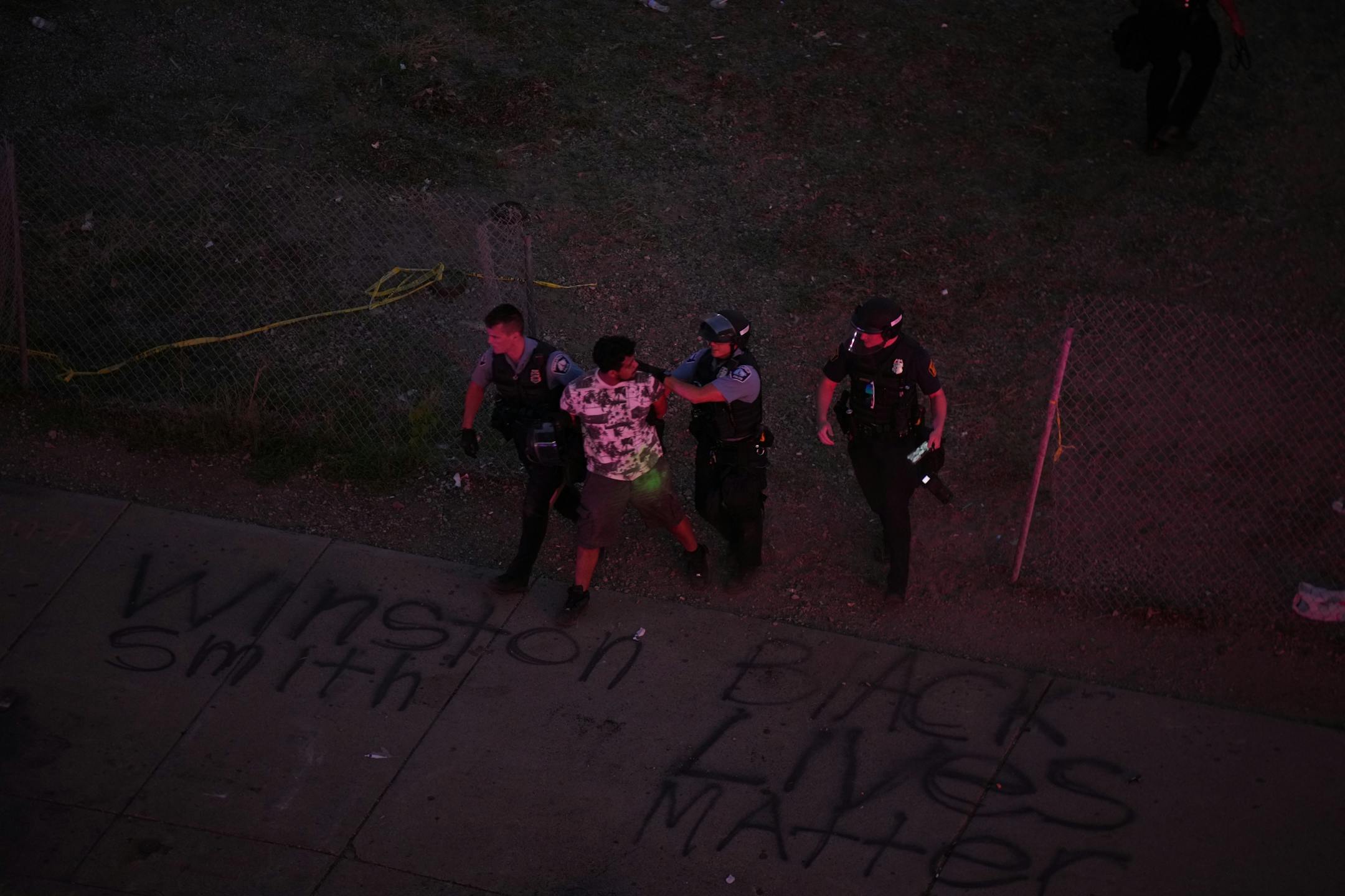 Minneapolis Police descended on the block long stretch of Lake St. in Uptown just before sunset Tuesday night, June 15, 2021 to dismantle the barricades erected by protesters.