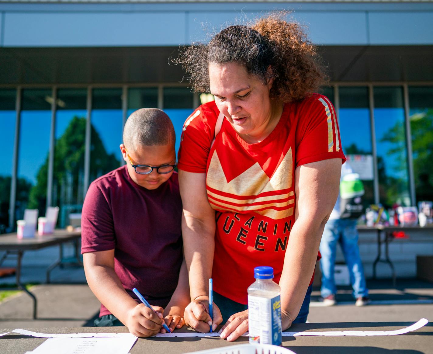 Mary and RyLe bought raffle tickets at Highland Park Elementary School's end-of-year carnival before Mary departed to finish a split shift at McDonalds. ] MARK VANCLEAVE &#xa5; Mary Spaulding and her son RyLe will being seeing an increase in state aid through the Minnesota Family Investment Program. Spaulding says the extra $100 each month will help her get ahead of unpaid bills and rent. Photographed Thursday, Jun 6, 2019 in St. Paul.