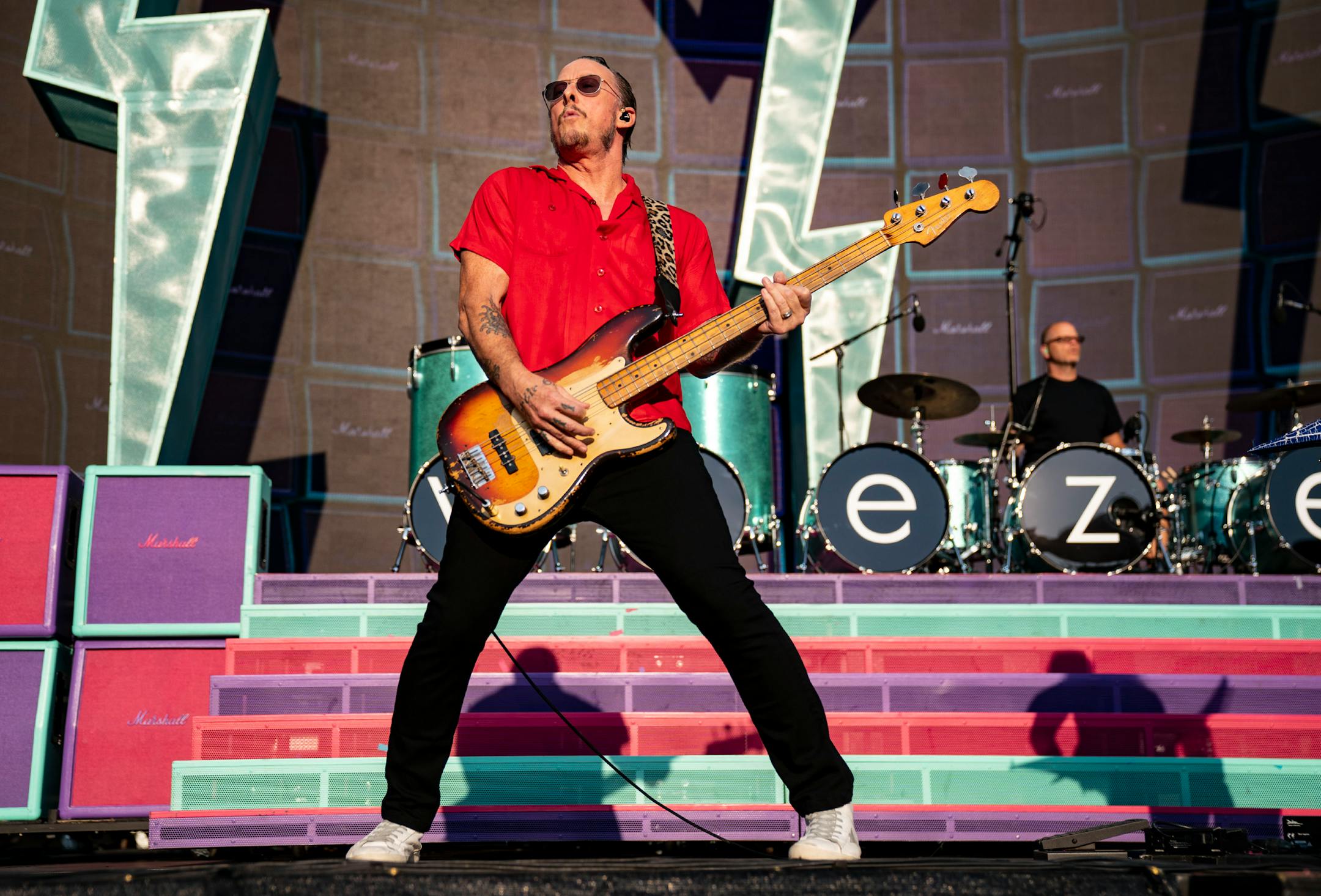 Scott Shriner, guitarist for Weezer, performed with the band as part of the Hella Mega Tour on Monday evening at Target Field.