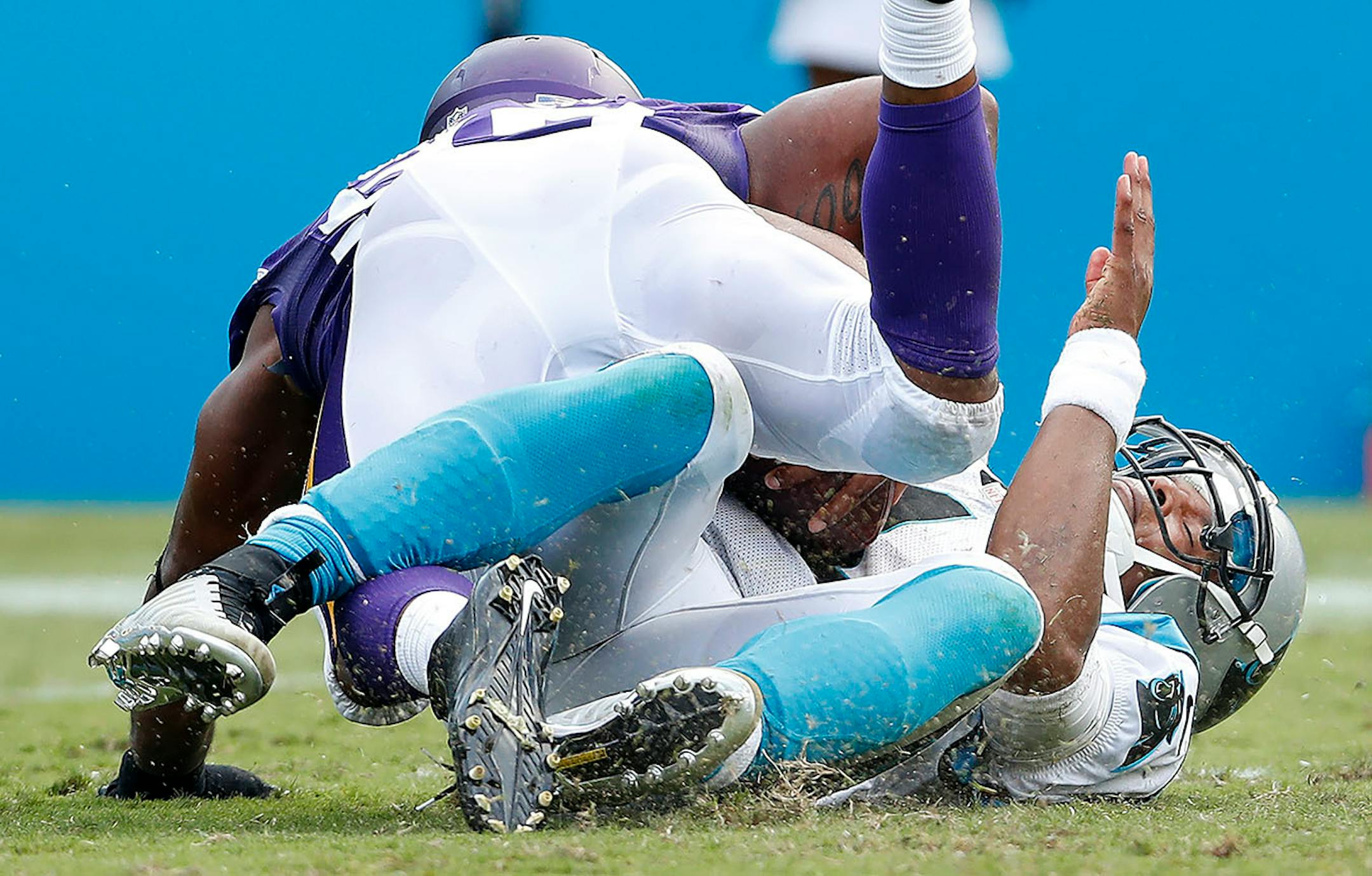 Everson Griffen (97) sacked Cam Newton (1) in the fourth quarter.