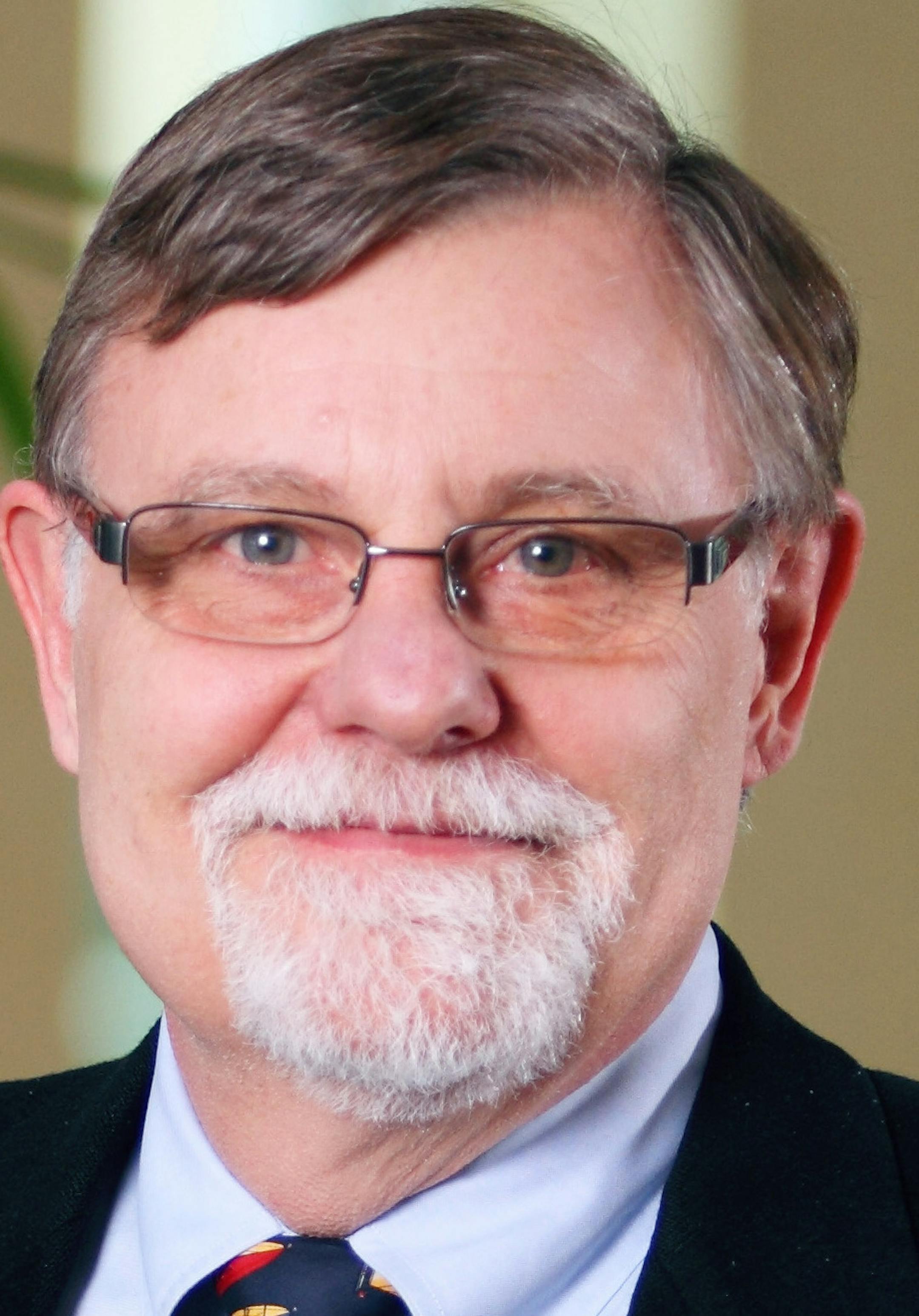 Environmental portrait of John Mirocha taken on Friday, April 12, 2013 on the Minneapolis campus of the University of St. Thomas.