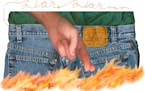 200 dpi 52p x 37p George Migash color illustration of crossed fingers behind the back of a pair of jeans the seat of which is burning symbolic of the 