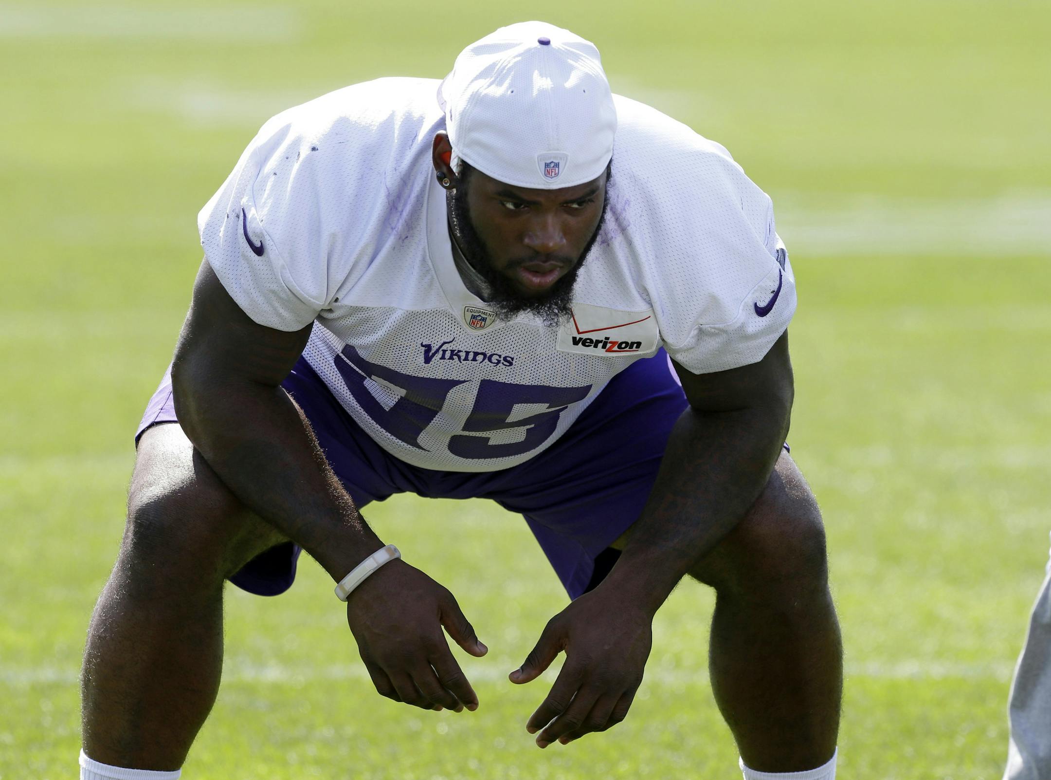 Minnesota Vikings rookie defensive tackle Sharrif Floyd (95), a first-round draft pick, lines up for one-on-one drill during NFL football training camp, Wednesday, Aug. 7, 2013 in Mankato, Minn. (AP Photo/Jim Mone) ORG XMIT: MIN2013090519180926