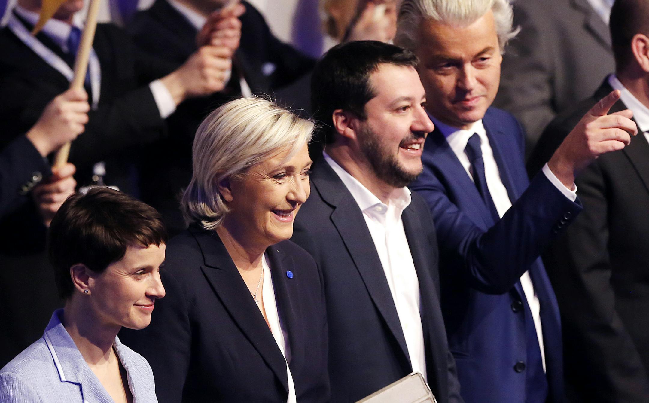 AfD (Alternative for Germany) chairwoman Frauke Petry, Far-right leader and candidate for next spring presidential elections Marine le Pen from France, Italian Lega Nord chief Matteo Salvini and Dutch populist anti-Islam lawmaker Geert Wilders , from left, stand together in the beginning of a meeting of European Nationalists in Koblenz, Germany, Saturday, Jan. 21, 2017. (AP Photo/Michael Probst)