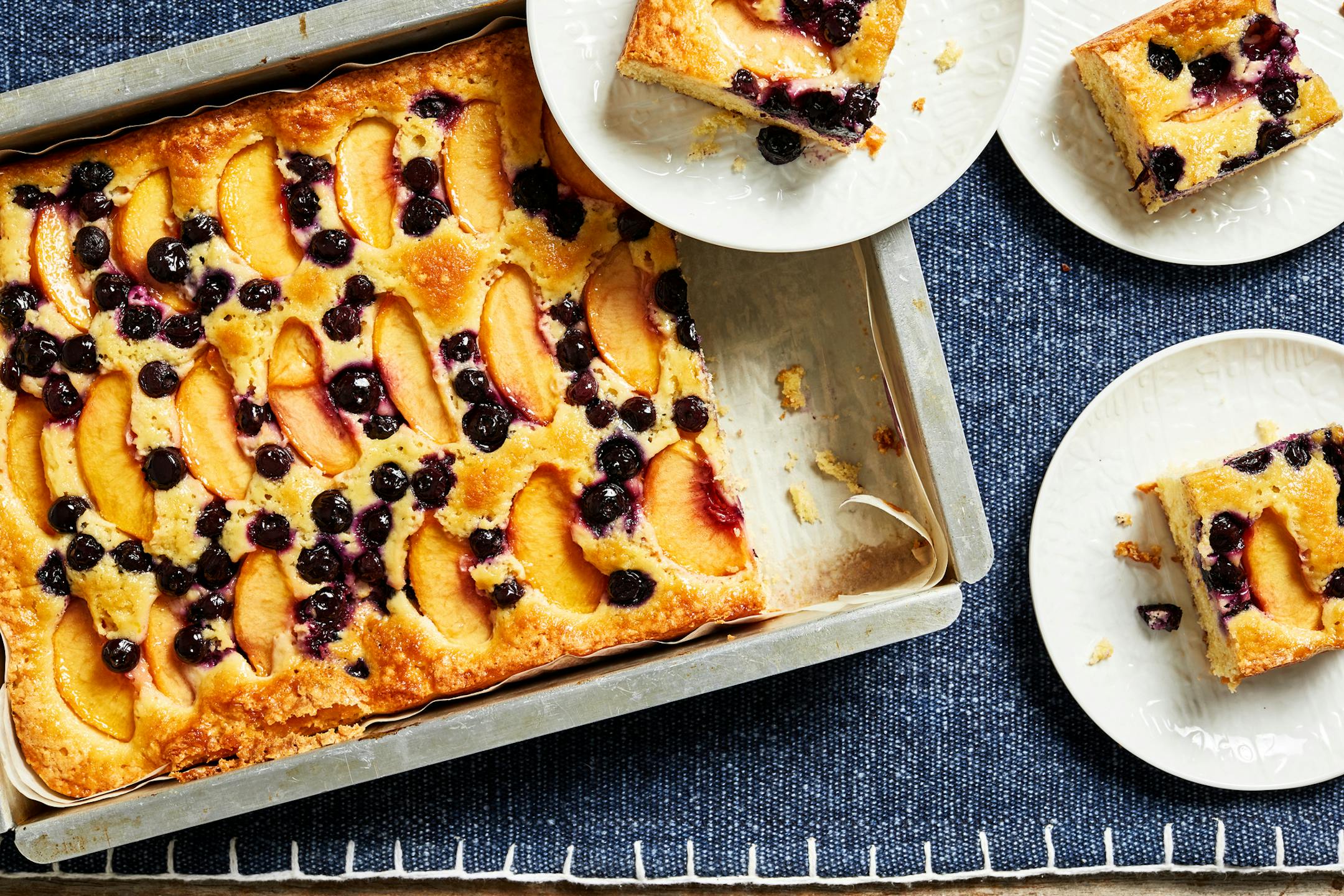 Buttermilk Sheet Cake With Peaches and Blueberries.