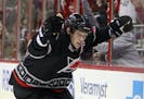 Carolina Hurricanes' Eric Staal (12) celebrates his hat trick goal against the Anaheim Ducks during the second period of an NHL hockey game, Saturday,