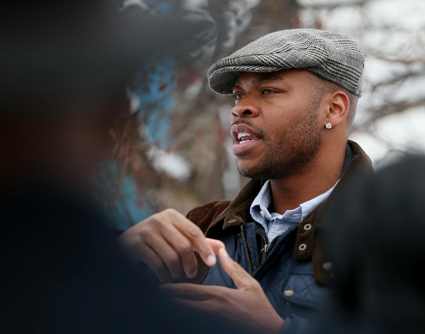 Former NBA basketball player Devean George talks to a group at the nothside lot that will house George's "Building Blocks" nonprofit that focuses on youth, education and family. ] JOELKOYAMA&#x201a;&#xc4;&#xa2;jkoyama@startribune Minneapolis, MN on March 19, 2014. Former NBA basketball player Devean George, a northside native and graduate of nearby Augsburg College, has assembled $11 million-plus in financing for "The Commons," 45 rental apartments for working-class families atop retail shops in