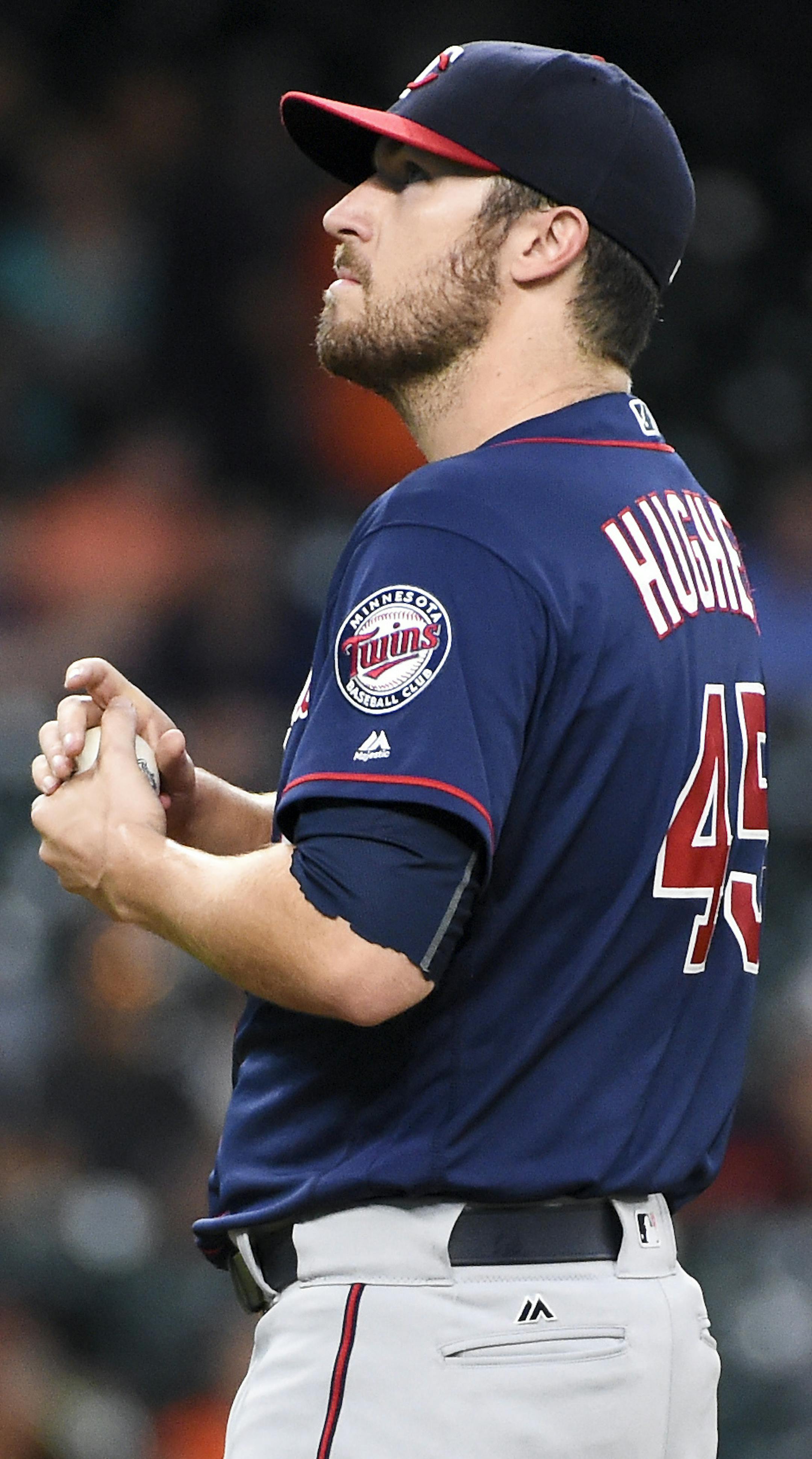 With the Houston Astros leading 6-0, Minnesota Twins starting pitcher Phil Hughes looks up at the scoreboard in the second inning of a baseball game, Wednesday, May 4, 2016, in Houston. (AP Photo/Eric Christian Smith)