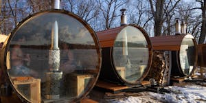 Visitors sit in wood-fired cedar saunas and look out over frozen Lake Minnewashta at Sauna Camp in Excelsior. “Sauna-preneurs” Danny and Sophie St