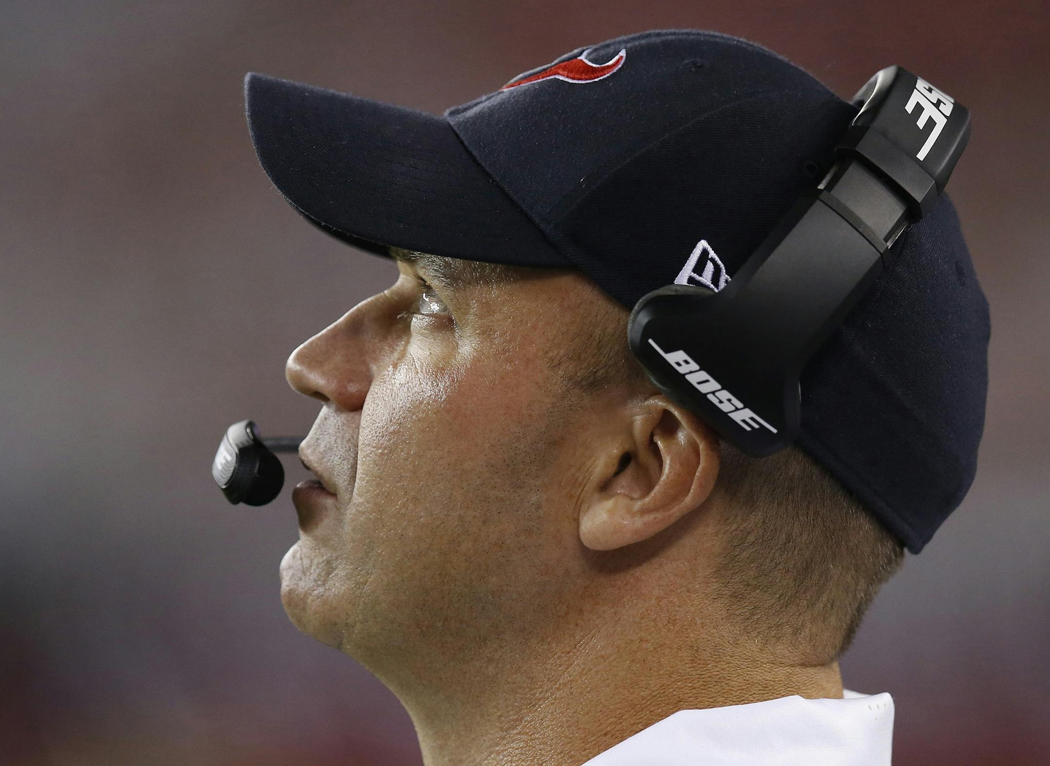 Houston Texans coach Bill O'Brien watches the flight of the ball on a kickoff during the second half of an NFL preseason football game against the Arizona Cardinals on Saturday, Aug. 9, 2014, in Glendale, Ariz. The Cardinals defeated the Texans 32-0. (AP Photo/Ross D. Franklin) ORG XMIT: PNP109