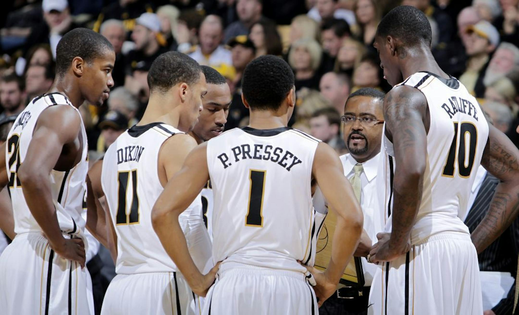Missouri coach Frank Haith speaks with his teama during the game against Texas at Mizzou Arena in Columbia, Missouri, Saturday, January 14, 2012. Missouri defeated Texas, 84-73.