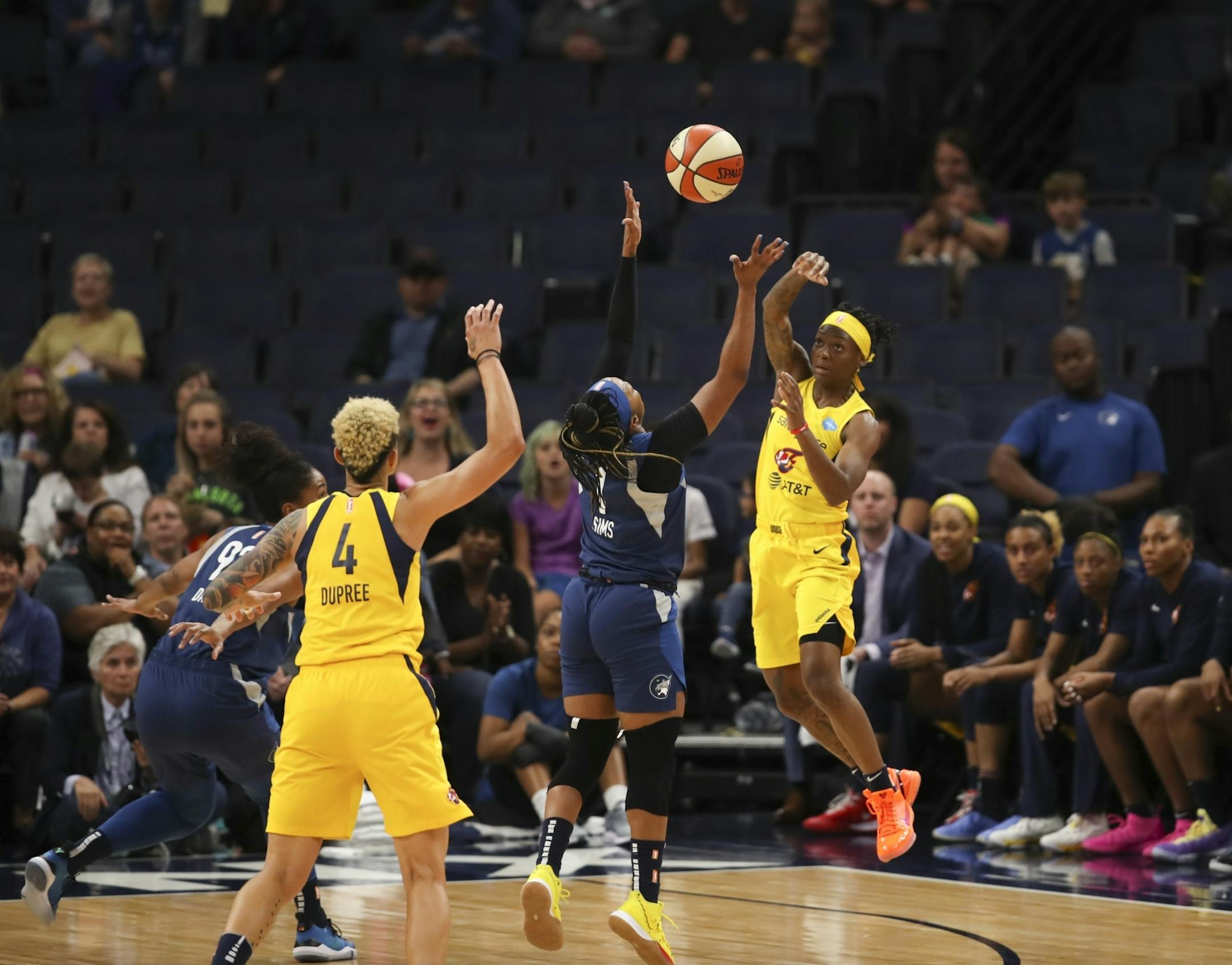 Minnesota Lynx guard Odyssey Sims (1) tried to reach a pass from Indiana Fever guard Erica Wheeler (17) to Indiana Fever forward Candice Dupree (4) in the first quarter.
