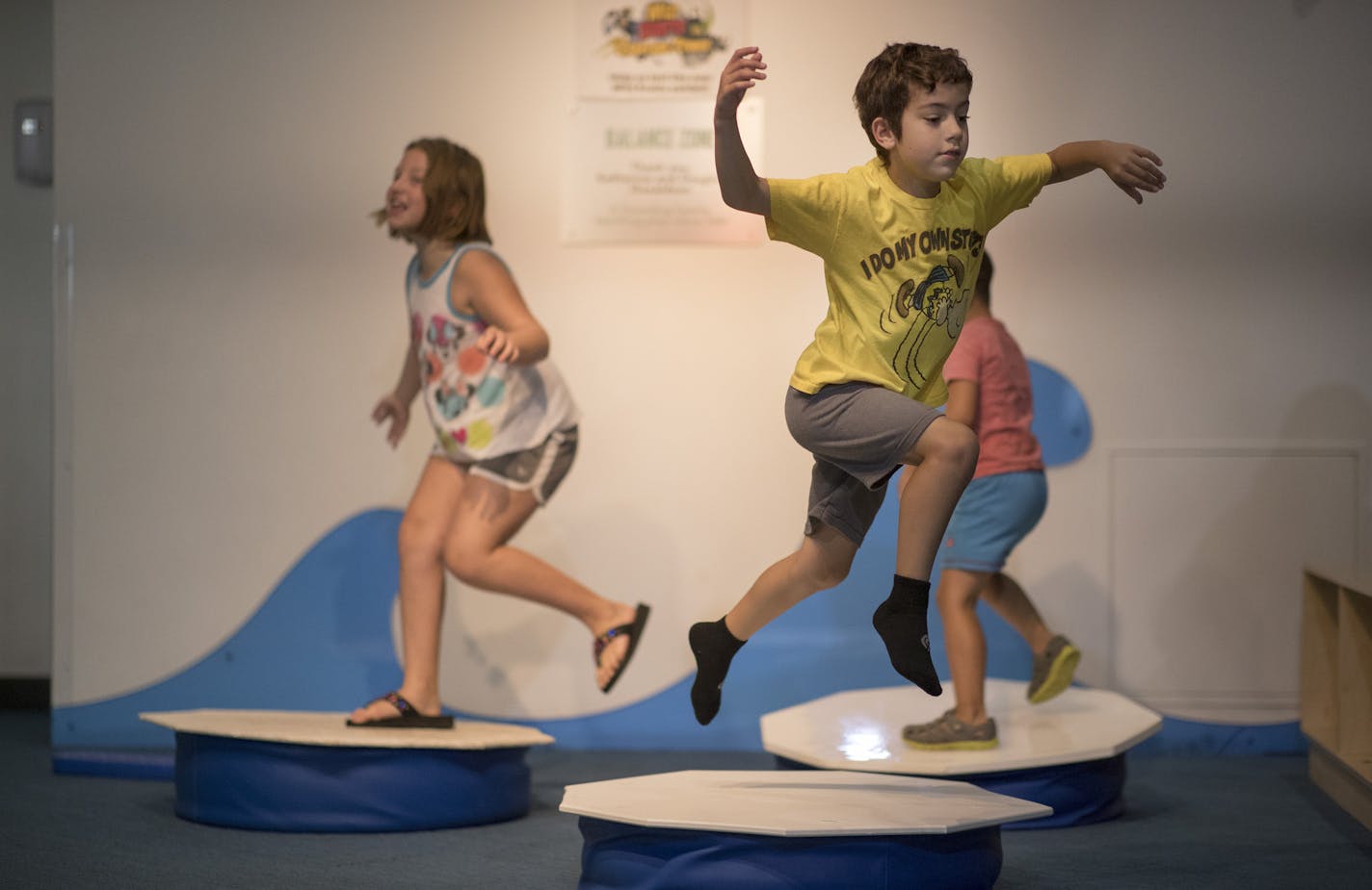 Alex Holger, 7 played on in the balance zone at the Minnesota Children's Museum Wednesday August 22, 2018 in St. Paul, MN.] JERRY HOLT &#x2022; jerry.holt@startribune.com