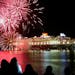 A firework display accompanies the departure of the world's biggest and most expensive cruise liner, the Queen Mary 2, as it sets sail on its maiden v
