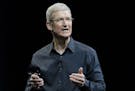 FILE - In this June 2, 2014, file photo, Apple CEO Tim Cook speaks at an event in San Francisco. The deadly attacks in Paris may soon reopen the debat