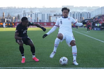 Weston McKennie (8) battled for the ball against Canada in Sunday’s World Cup soccer qualifier in Hamilton, Ontario.