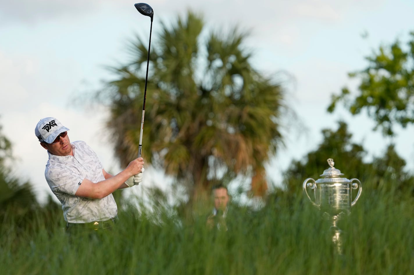 Derek Holmes watches his tee shot on the first hole during the first round of the PGA Championship golf tournament on the Ocean Course Thursday, May 20, 2021, in Kiawah Island, S.C. (AP Photo/David J. Phillip)