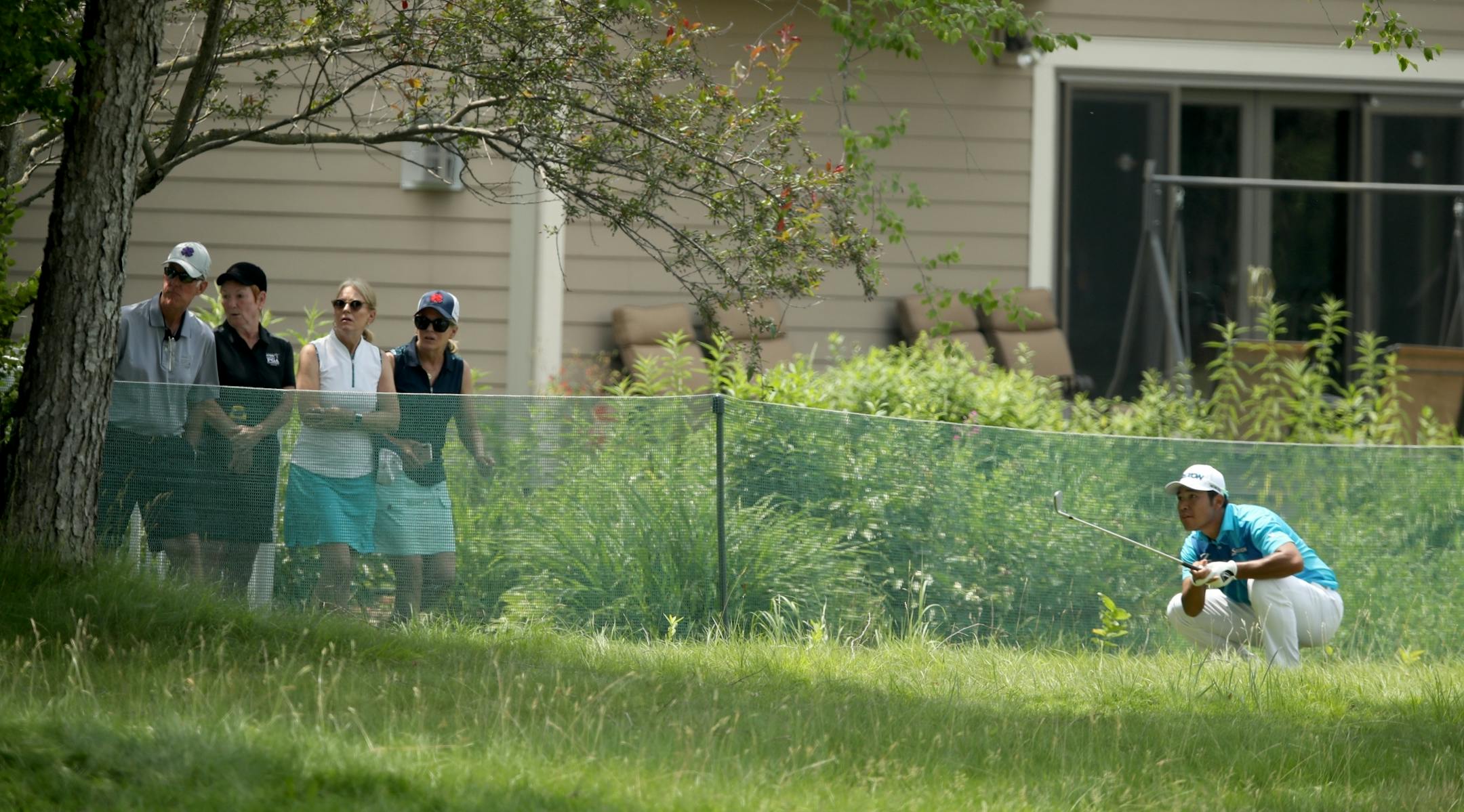 Hideki Matsuyama watched his ball as he hit out of the rough on the third hole during the final day of the 3M Open at TPC Twin Cities.