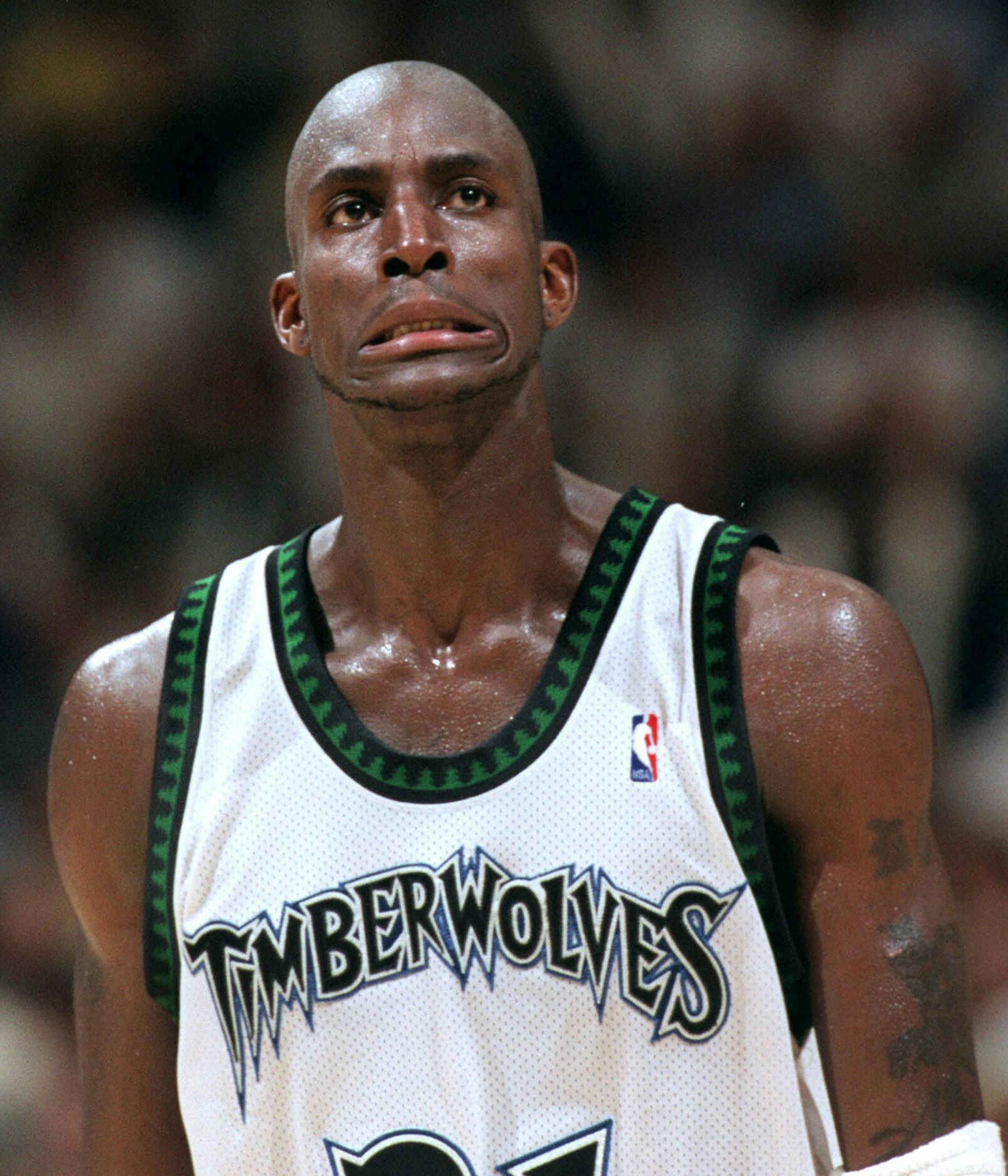 Minnesota Timberwolves forward Kevin Garnett grimaces while walking back on the court after a timeout with 32 seconds left and the Timberwolves trailing 81-77 in game four of the NBA playoffs in Minneapolis Tuesday, May 2, 2000. The Portland Trail Blazers beat the Timberwolves by a final score of 85-77 and eliminating the Wolves from the series. (AP Photo/Minneapolis Star Tribune, Carlos Gonzalez)