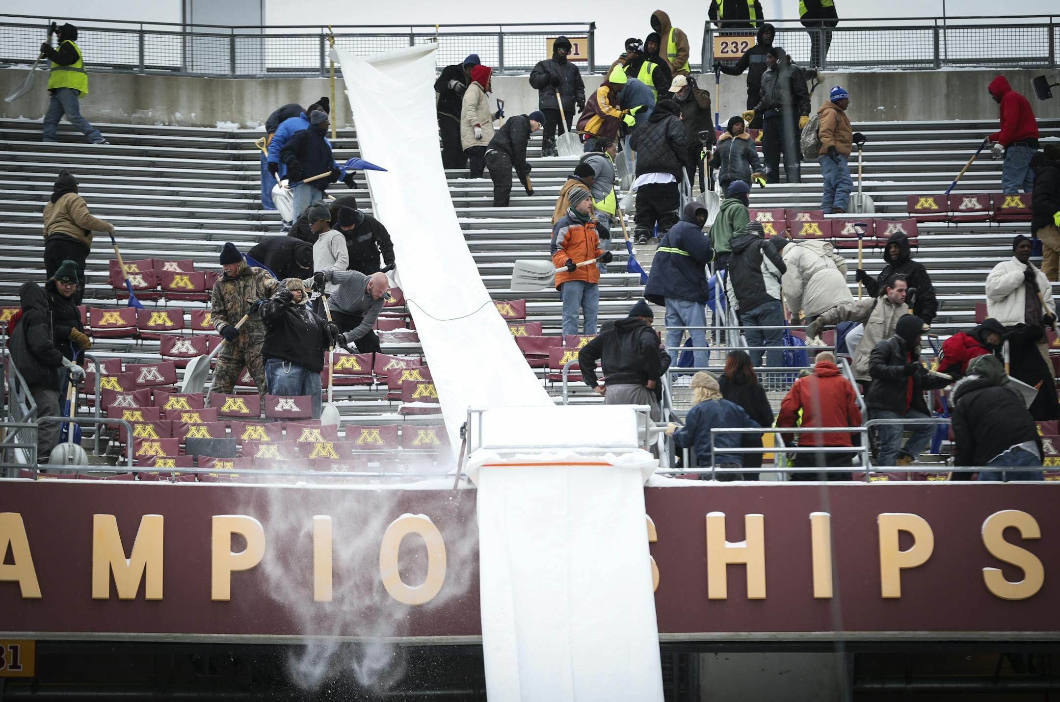 TCF Bank Stadium was buried in snow that had to be removed by Saturday for the Gophers football game.