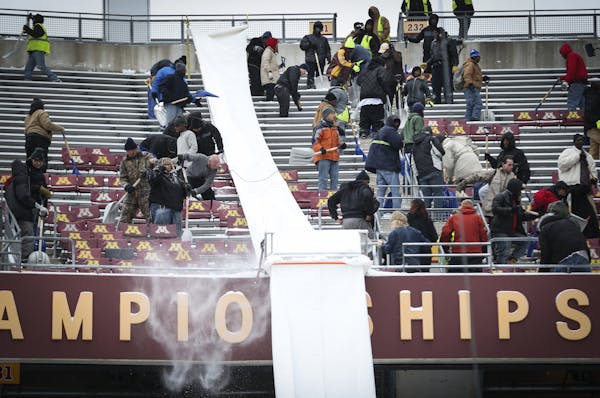 TCF Bank Stadium was buried in snow that had to be removed by Saturday for the Gophers football game.