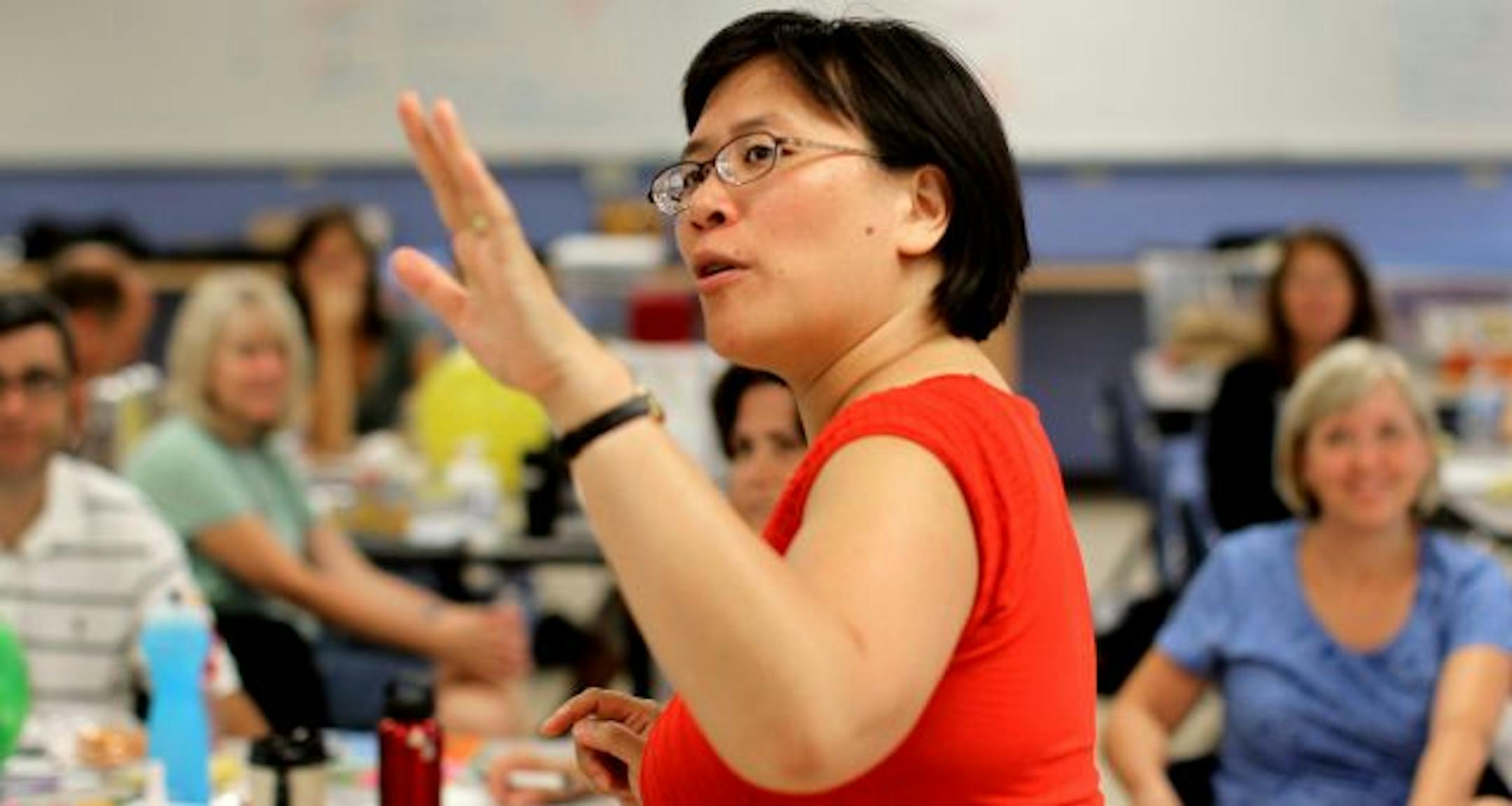 Yvonne Ng, assistant professor of computer science at St. Catherine University, talked with teachers from Richfield who will receive training throughout the year from St. Catherine University faculty on science, technology, engineering and math.