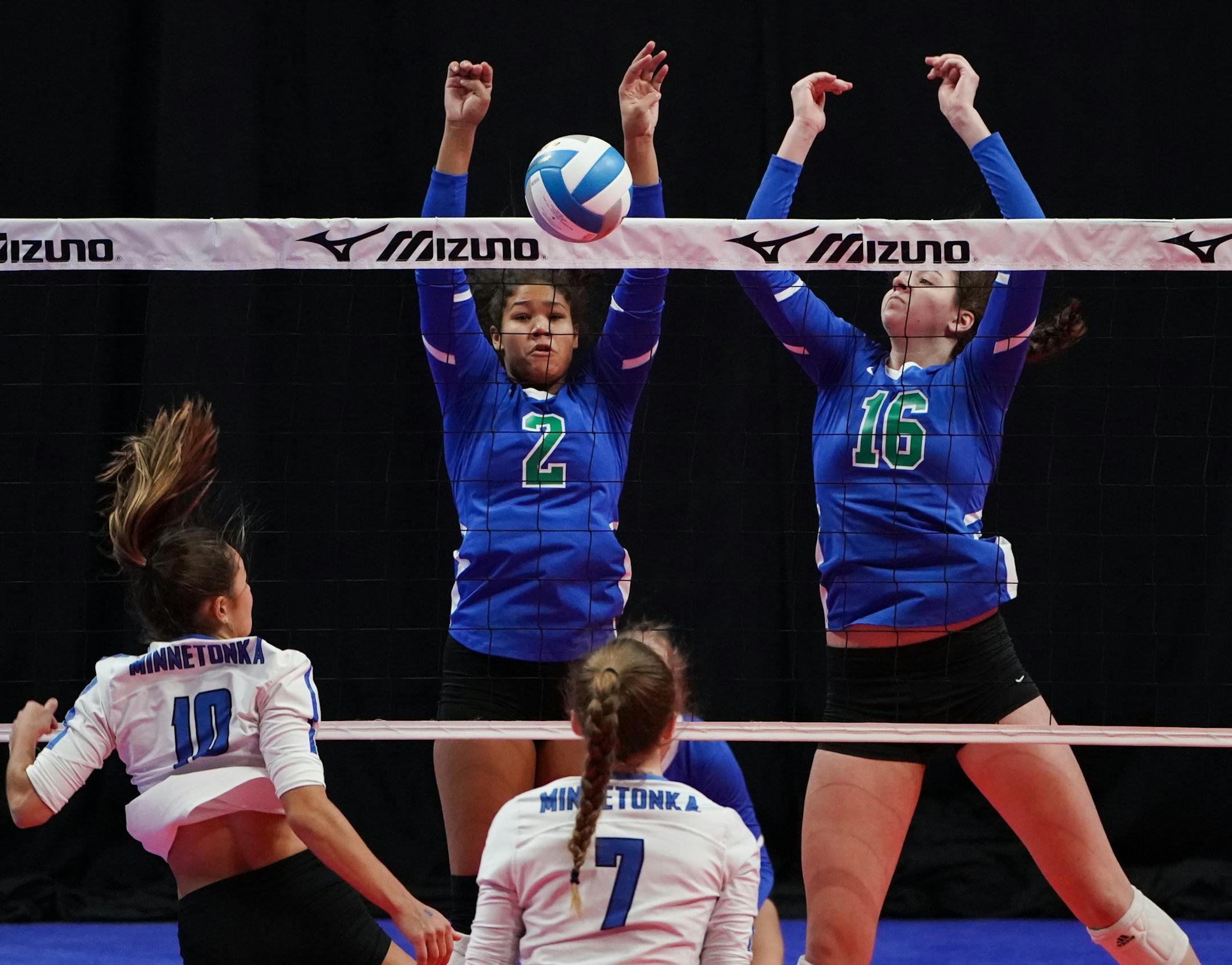 Eagan setter Kennedi Orr (2) middle hitter Kendal Kemp (16) went up for a block against a hit by Minnetonka outside hitter Skyler Germann (10). ] Shari L. Gross ¥ shari.gross@startribune.com Eagan held off Minnetonka to win 3-2 in Class 3A volleyball semifinals held at Xcel Energy Center in St. Paul, Minn. on Friday, Nov. 8, 2019. Eagan vs. Minnetonka 9am Wayzata vs. North, St. Paul 11am