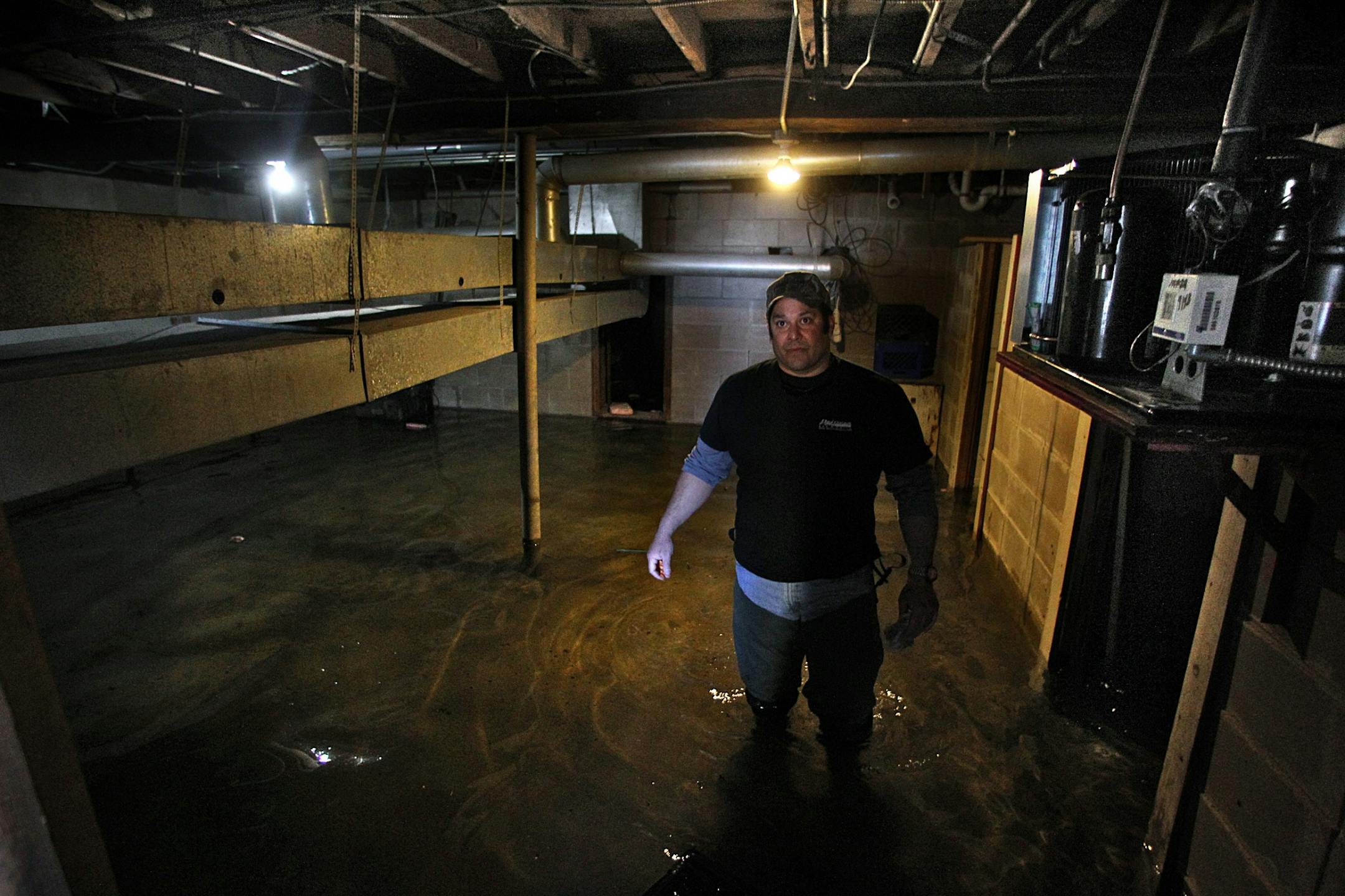 Billy Ruitz, owner of Drifters Bar and Grill, explained how he has flooded the basement of his establishment with fresh water in order to equalize pressure as waters from the surrounding Mississippi River rise. He said that the fresh water also helps to make it easier to clean up after dirtier flood waters recede.