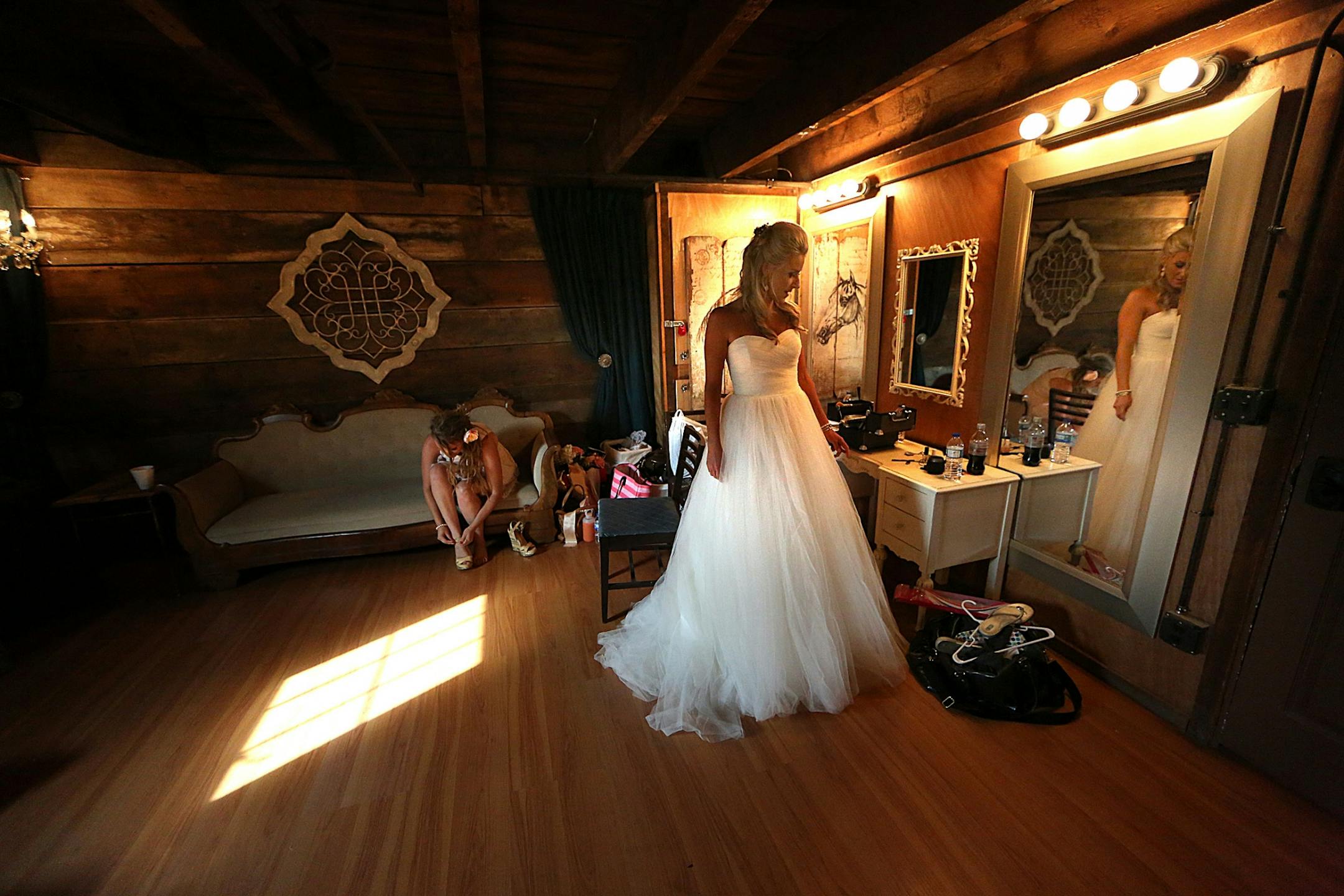 Bride Savannah Koehnen waited in a dressing room at Hope Glen Farm, just moments before she was to join her father, Gary Koehnen, to walk up the aisle. The groom was Jeremy Eckert.