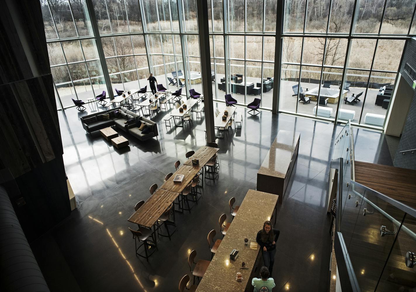 Chuck Runyon, CEO of Anytime Fitness gave a tour of its corporate headquarters which moved from Hastings to Woodbury and has not wasted the opportunity to build something new and unique. The common area has a view of its wetland.] Richard Tsong-Taatarii/rtsong-taatarii@startribune.com