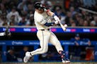 Twins catcher Ryan Jeffers (27) hits a solo home run against the Dodgers on April 9. Jeffers has nine home runs this season; eight have come when he h