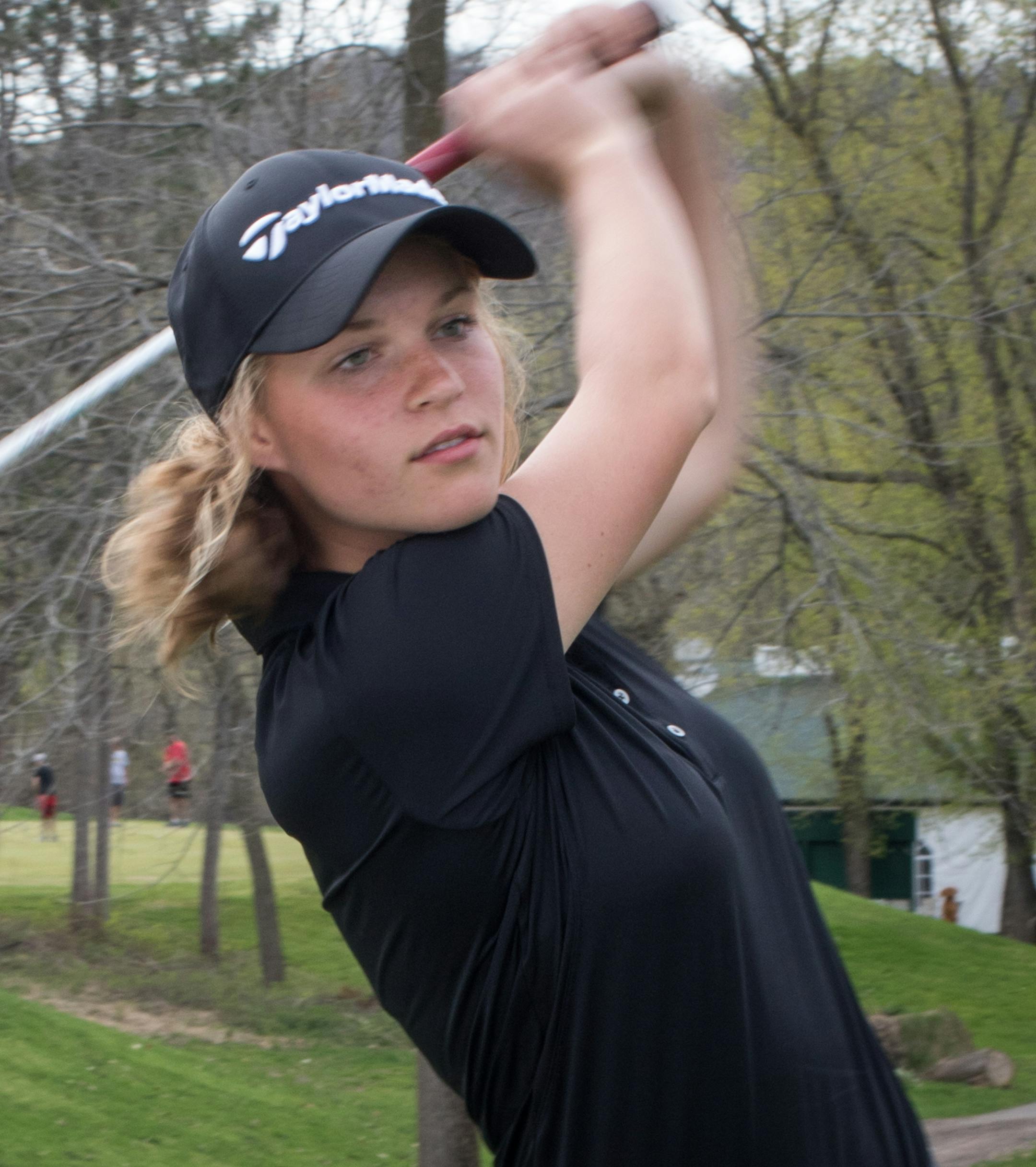 Red Wing sophomore Leah Herzog swinging her club at the picturesque Mississippi National Golf Course. Photo By: Matt Weber