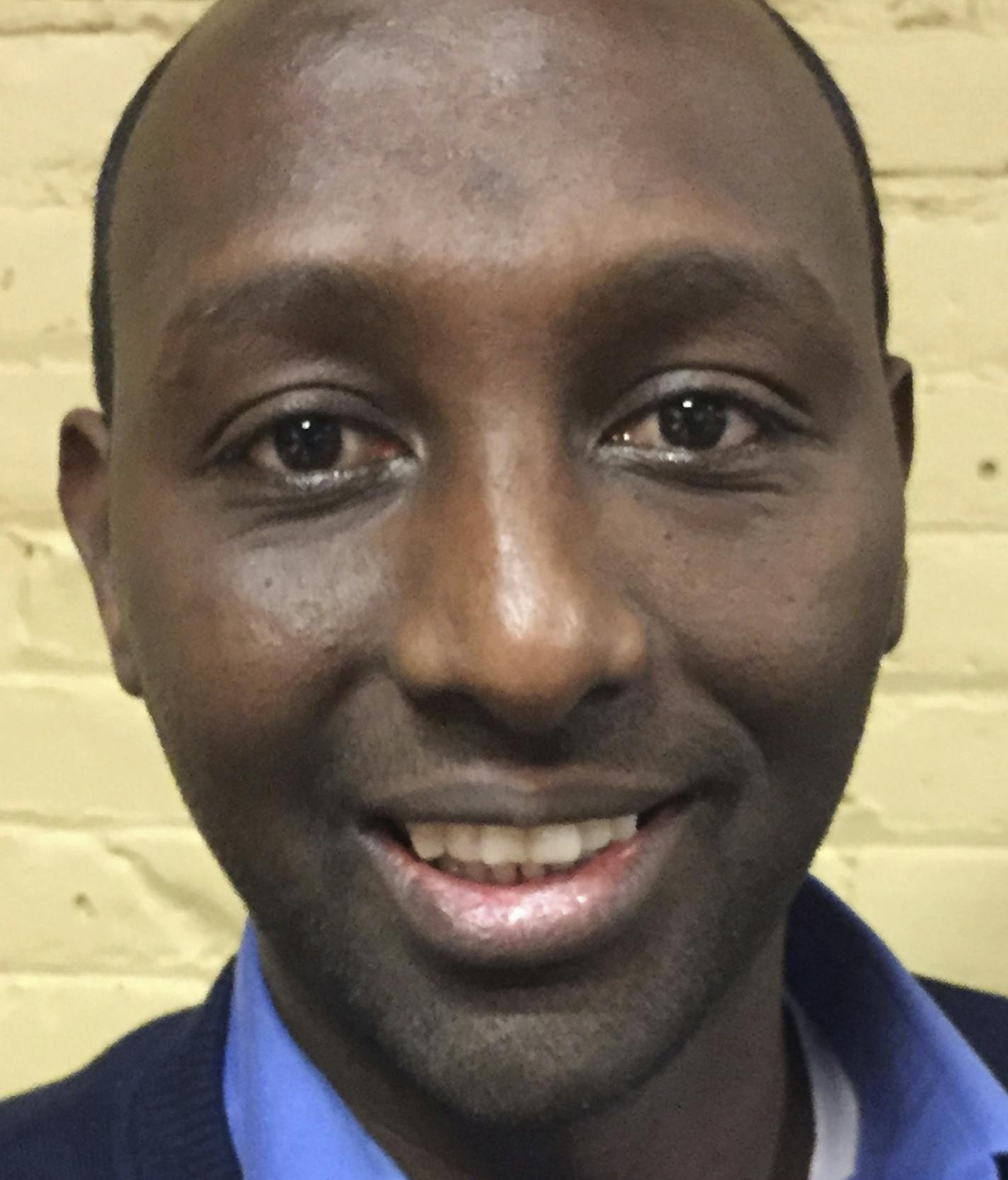 In this Dec. 20, 2016 photo, Mohamud Noor, executive director of the Confederation of Somali Community in Minnesota, poses for a photo at an employment center in Minneapolis' largest Somali neighborhood. Noor's organization created the center with grant money as part of a federal pilot project designed to combat terror recruitment by creating positive opportunities for youth. (AP Photo/Amy Forliti)