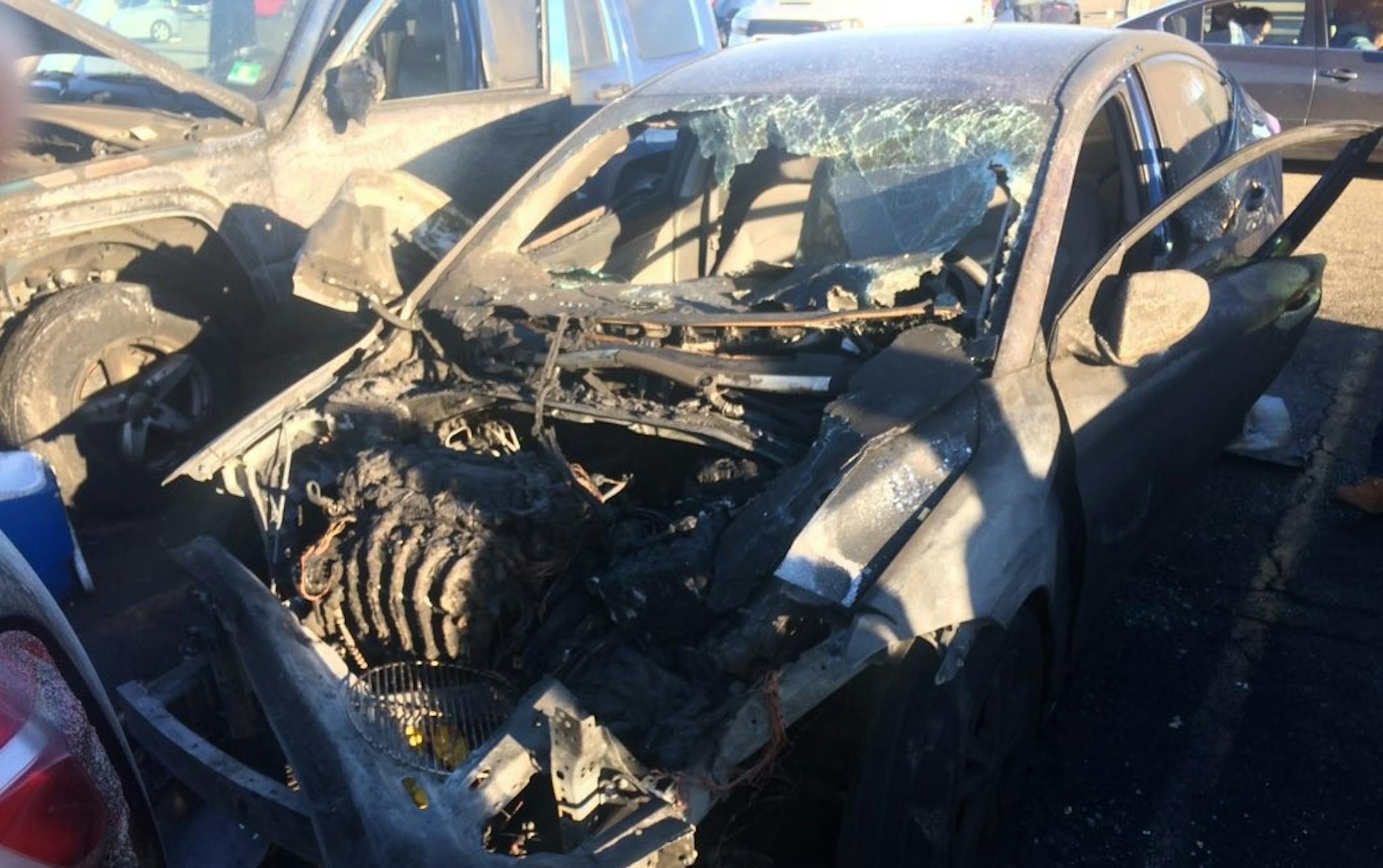 Gina Smith's burned out car. Photo courtesy of Gina Smith