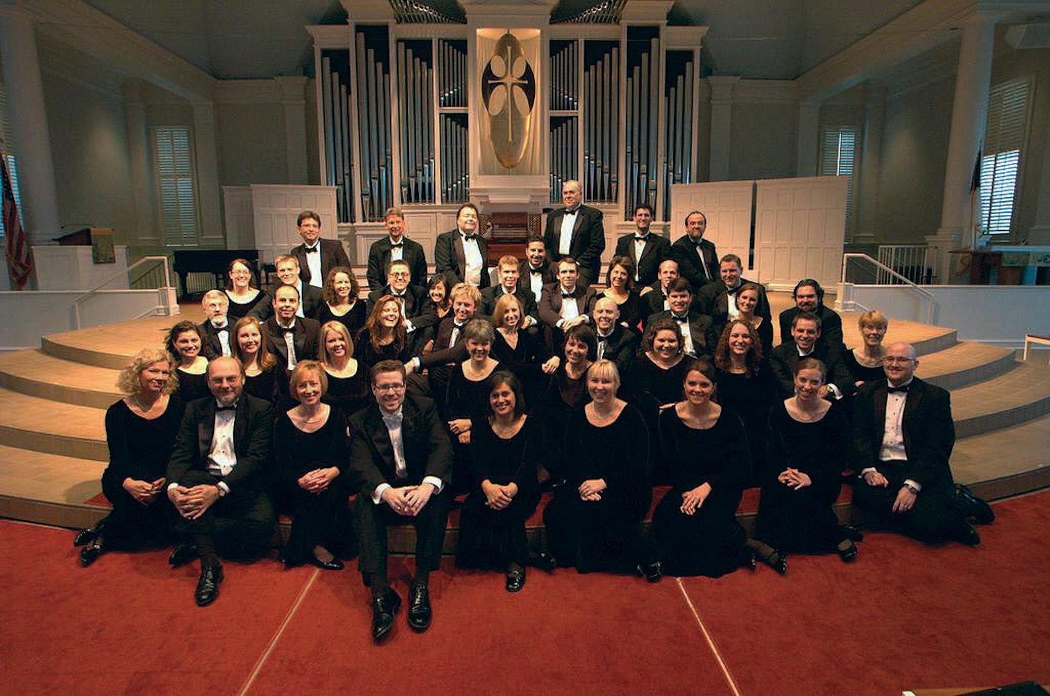 The Singers, with artistic director Matthew Cullton, center.