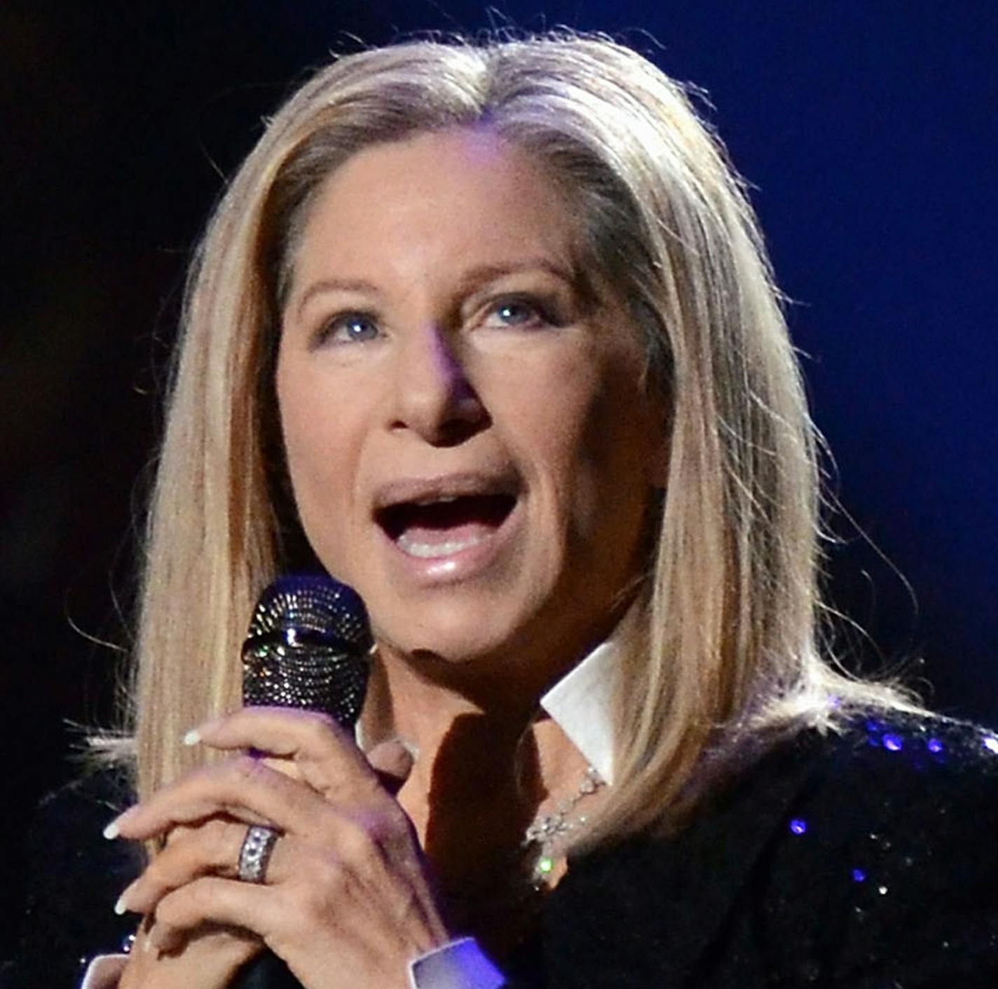 FILE - In this Oct. 11, 2012, file photo, singer Barbra Streisand performs at the Barclays Center in the Brooklyn borough of New York. During a Friday, March 16, 2018 tribute to her decades of TV music specials and other programs, Streisand said she's never suffered sexual harassment but has felt abused by the media. (Photo by Evan Agostini/Invision/AP, File)