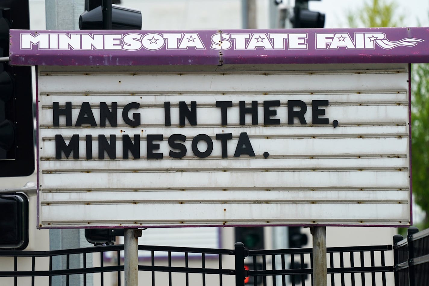 A sign of encouragement stood at the main entrance to the State Fairgrounds on May 21.