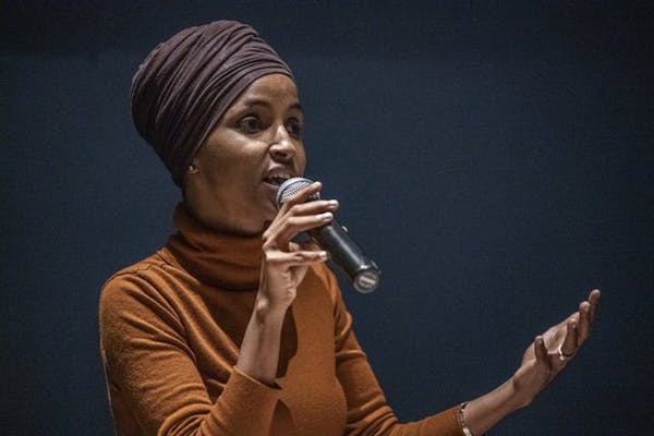 Rep. Ilhan Omar (D-Minn.) speaks during a town hall meeting at the Colin Powell Center in Minneapolis.