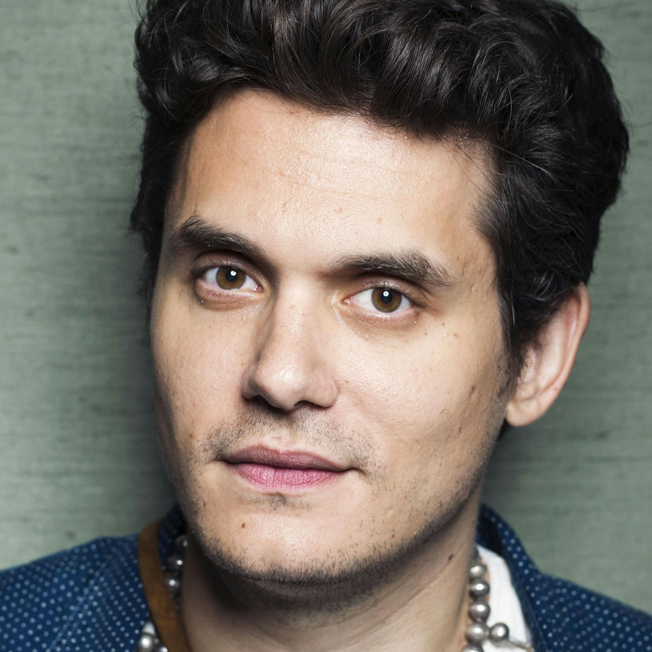 This Aug. 12, 2013 file photo shows singer-songwriter John Mayer poses in New York. Mayer is releasing his sixth album, ìParadise Valley,î on Tuesday, Aug. 20. It features collaborations with his singer-girlfriend Katy Perry and R&B singer Frank Ocean. (Photo by Victoria Will/Invision/AP) ORG XMIT: MIN2013082115292272